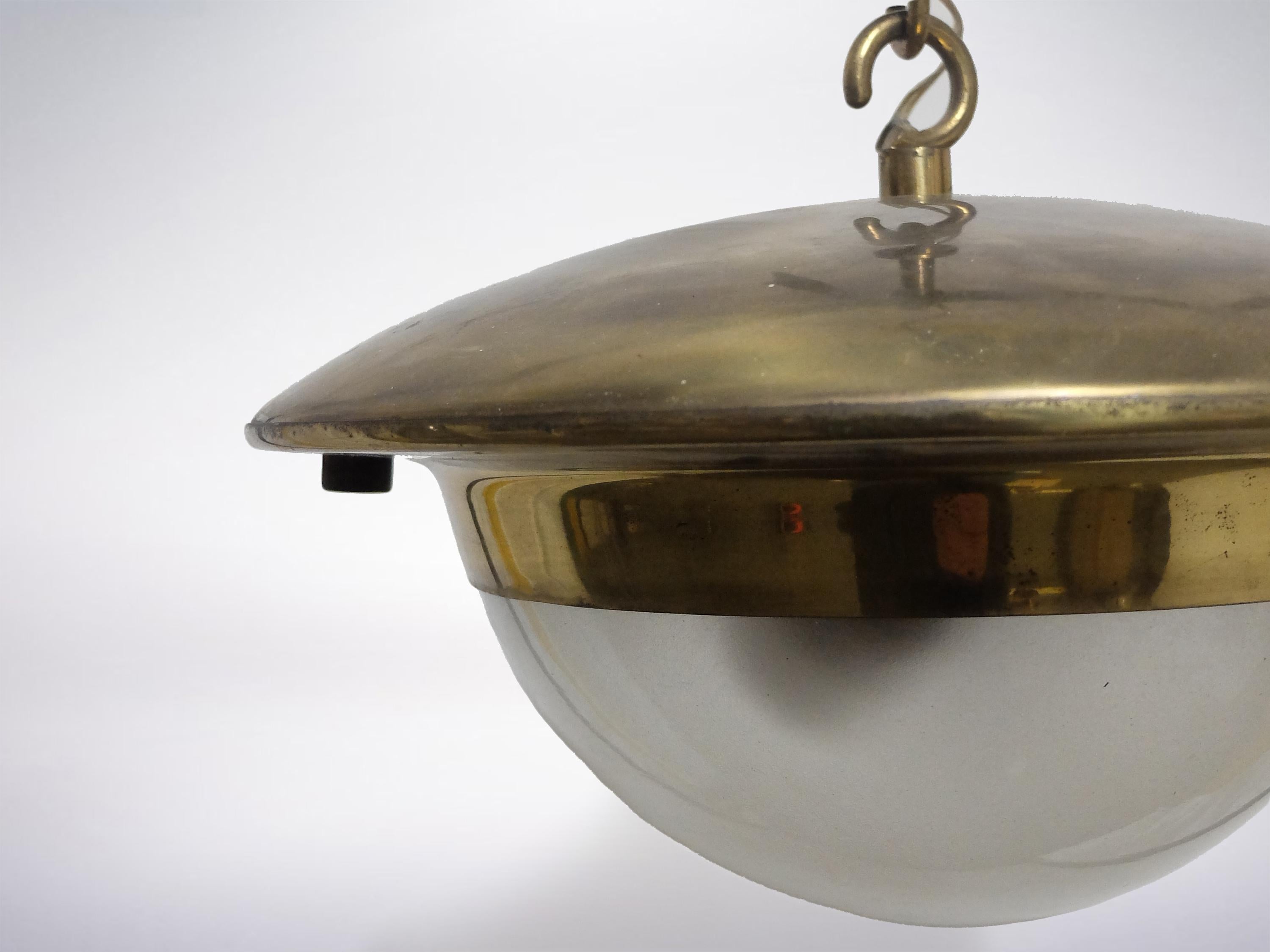 Luigi Caccia Dominioni brass lamp for Azucena, 1950s

Gigantic large Italian mid century brass pendant lamp with one large glass ball shade.
Designed by Luigi Caccia Dominioni for Azucena.
Beautiful rare design with lots of details. Made in