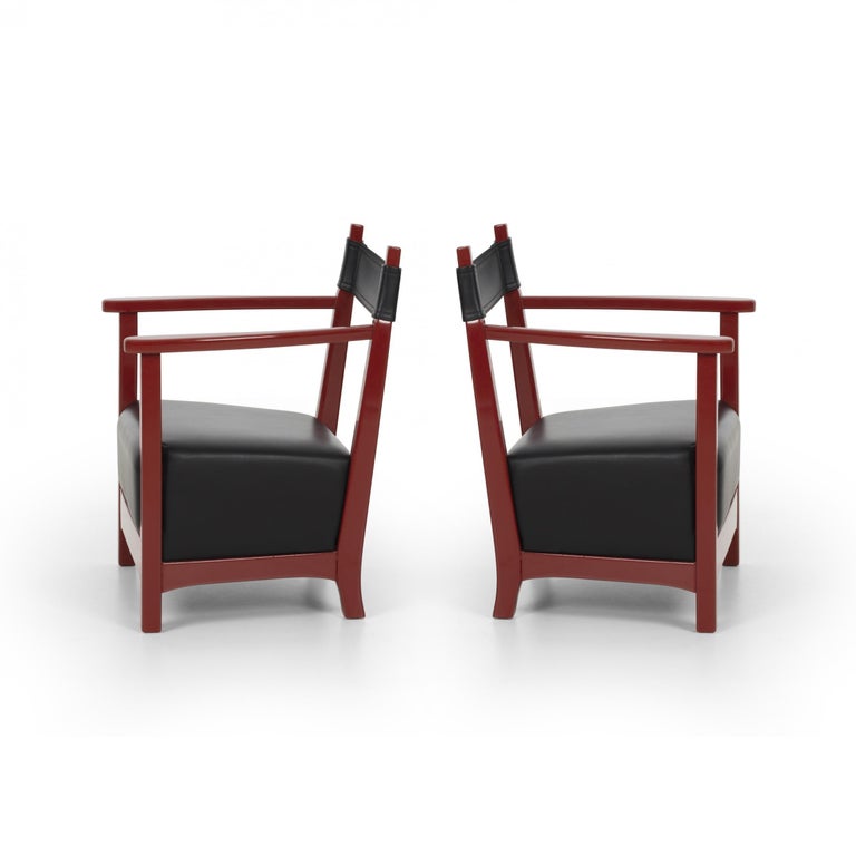 Luigi Caccia Dominioni Chinotto Azucena easy lounge chairs for Azucena with structure in solid wood lacquered. Back rest and seat black leather.