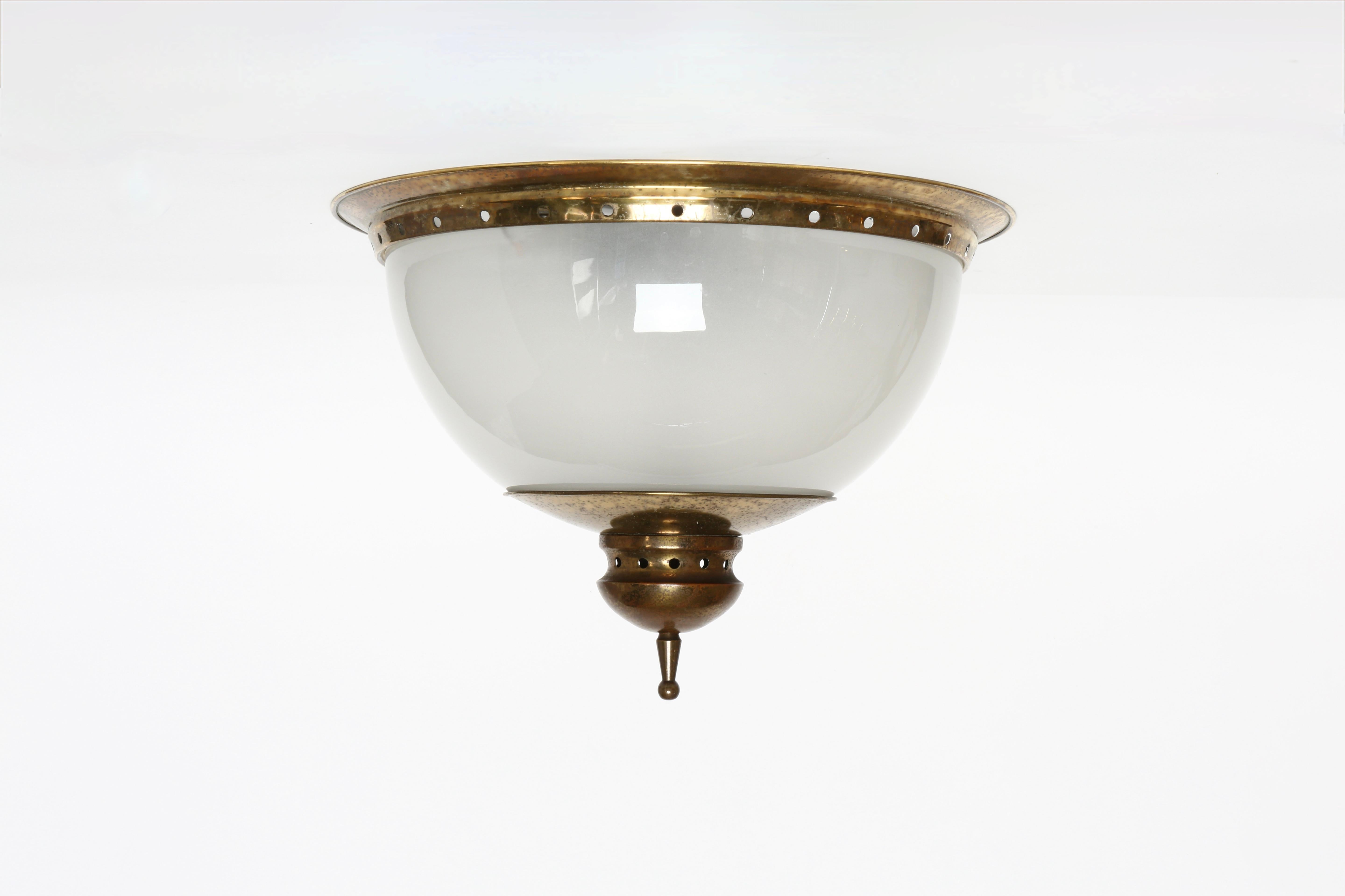 Luigi Caccia Dominioni for Azucena wall or ceiling light
Made in Italy, 1960s
Opalescent glass, brass
Takes 2 medium base bulbs
Complimentary US rewiring upon request
Price is for 1 light
3 lights are available.

We take pride in bringing vintage