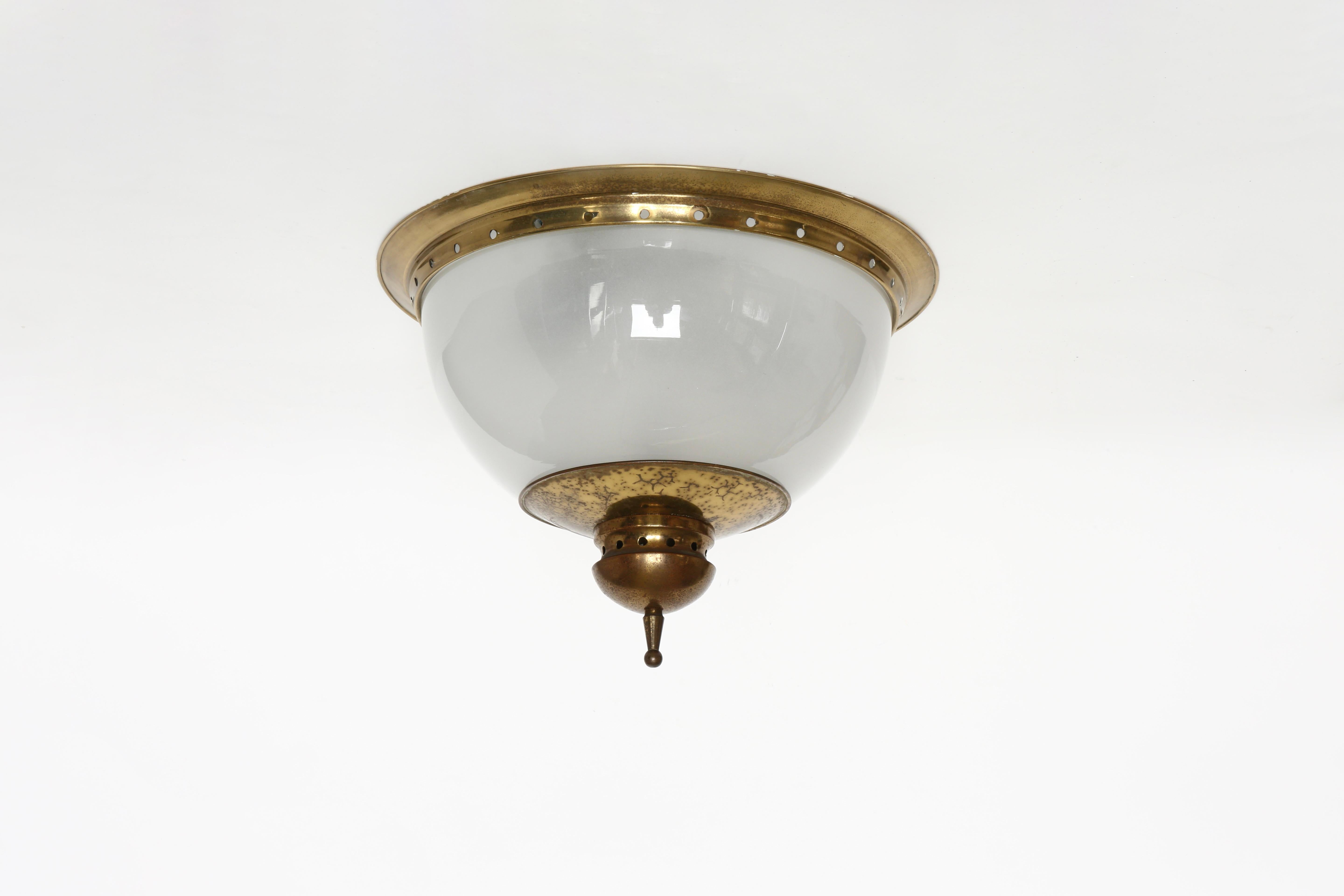 Luigi Caccia Dominioni for Azucena wall or ceiling light
Made in Italy, 1960s
Opalescent glass, brass
Takes 2 medium base bulbs
Complimentary US rewiring upon request
Price is for 1 light
2 lights are available.

We take pride in bringing vintage