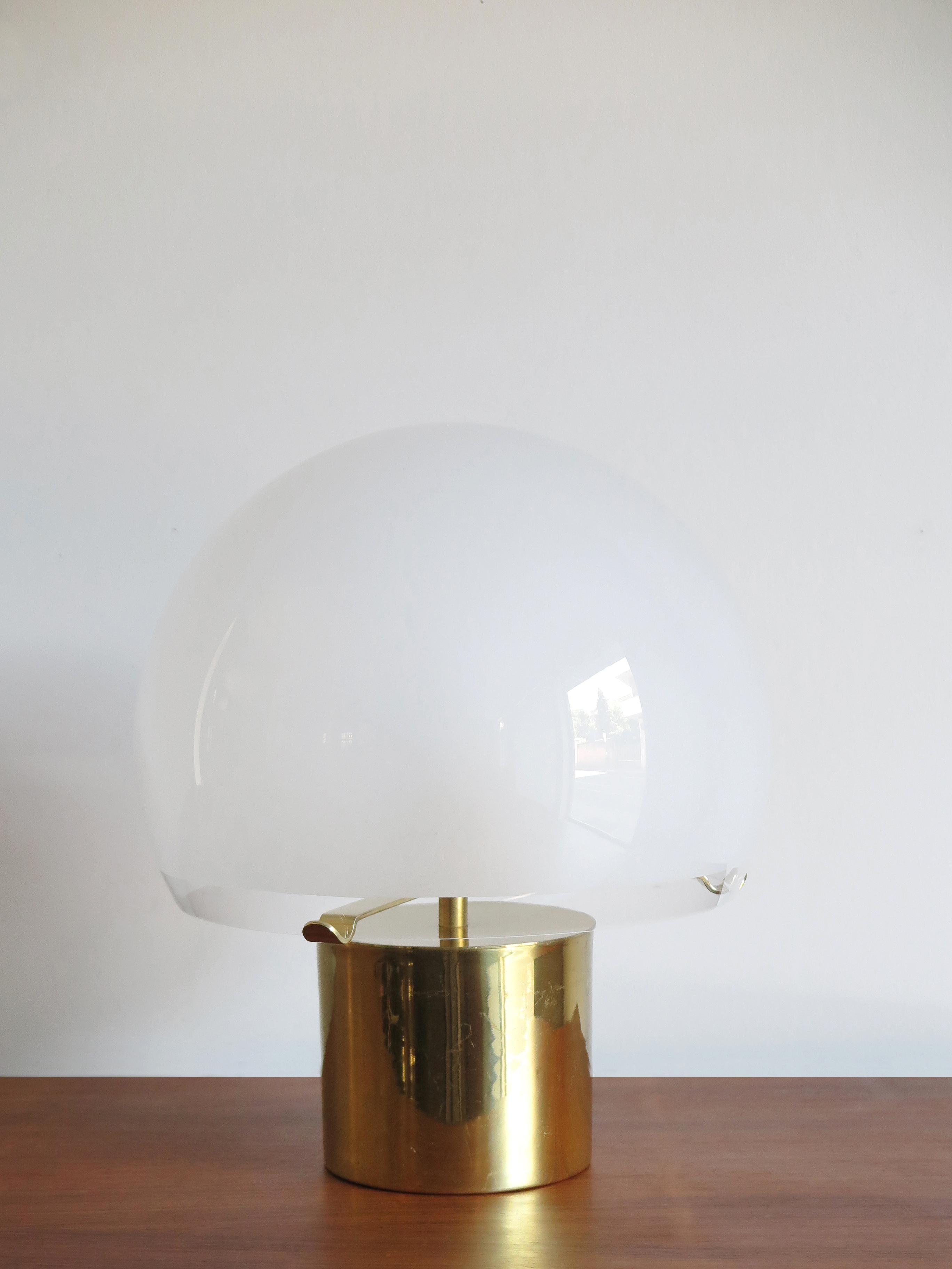 Italian Mid-Century Modern design table lamp model “LTA6 Porcino”
designed by Luigi Caccia Dominioni and produced by Azucena Milano from 1967, cylindrical brass base, blown glass diffuser frosted on the internal surface,