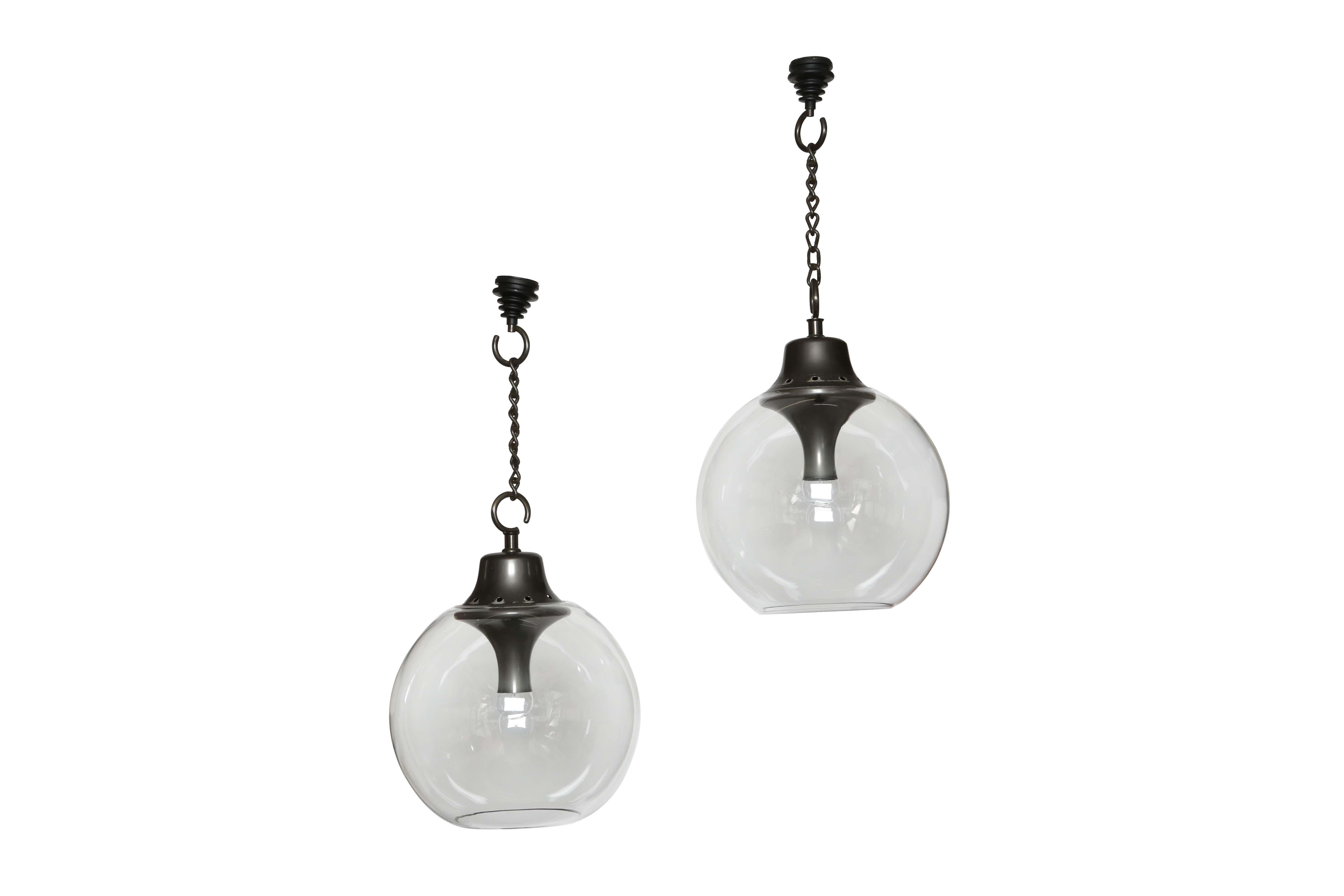 Luigi Caccia Dominioni for Azucena ceiling suspension lights.
Model LS10 Boccia. Designed and manufactured in Italy in 1960s.
Murano glass, patinated aluminum glass holder and steel chain.
Complimentary US rewiring upon request.
Priced and sold as a