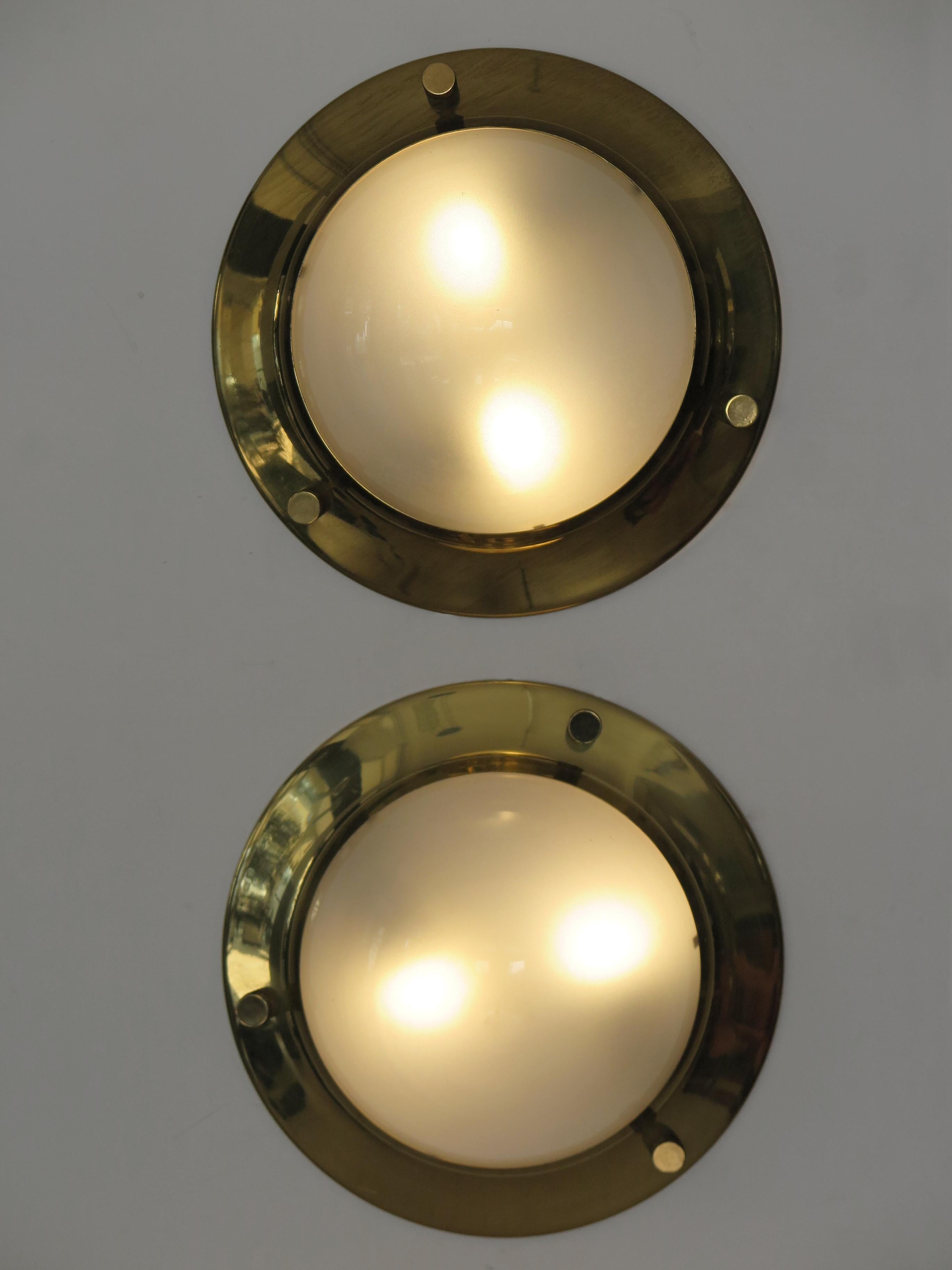 Italian Mid-Century Modern design set of two scones wall lamps or ceiling lamps model “LSP6 Tommy” large version designed by Luigi Caccia Dominioni (Milan 1913 - Milan 2016) and produced by Azucena from 1965 with polished brass frame and half-sphere