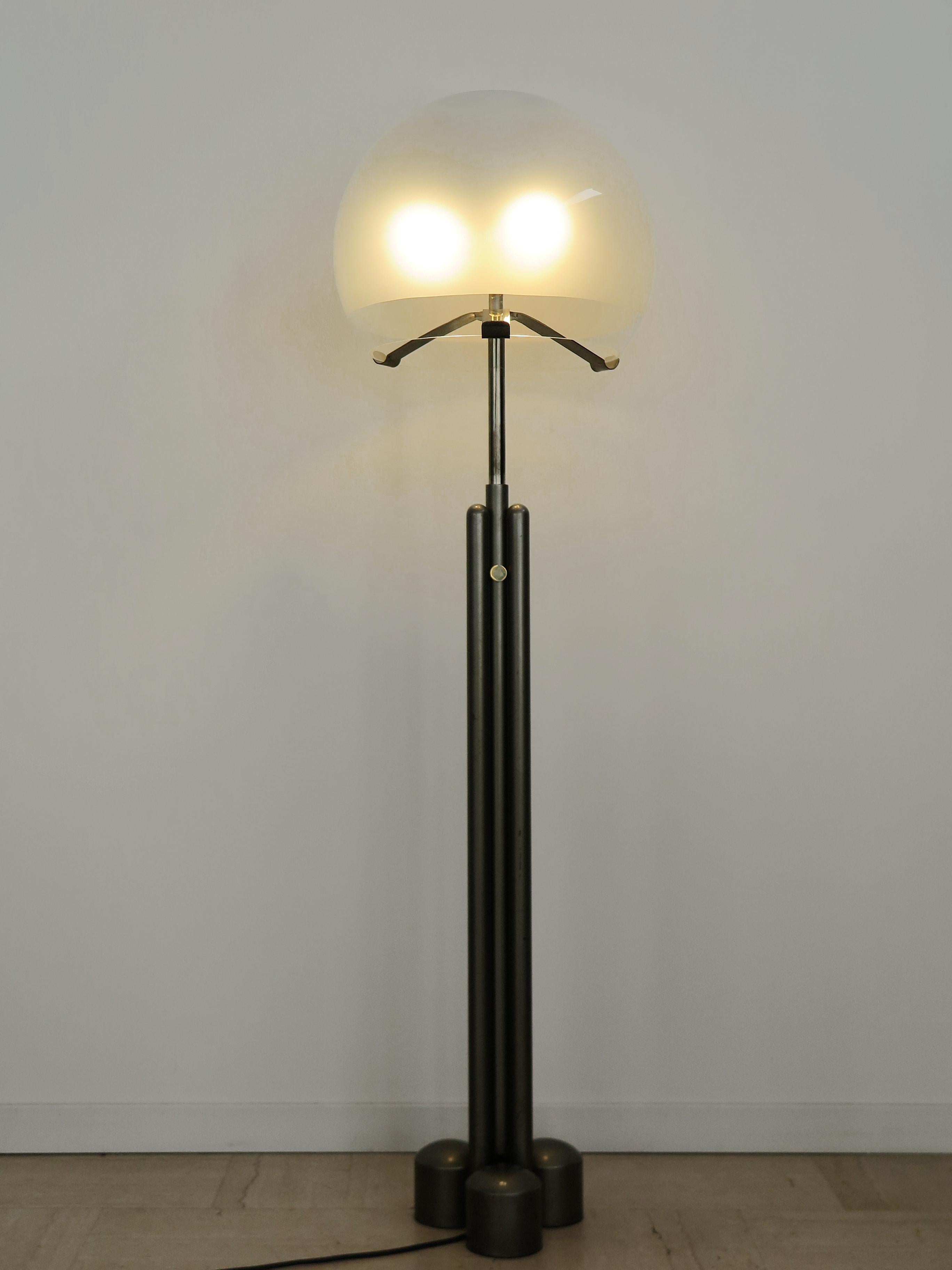 Italian midcentury modern design floor lamp adjustable in height model “LTE13 Porcino Terra” designed by Luigi Caccia Dominioni and produced by Azucena Milano from 1968.
Chromed steel and gray painted metal stem and clear and frosted glass diffuser