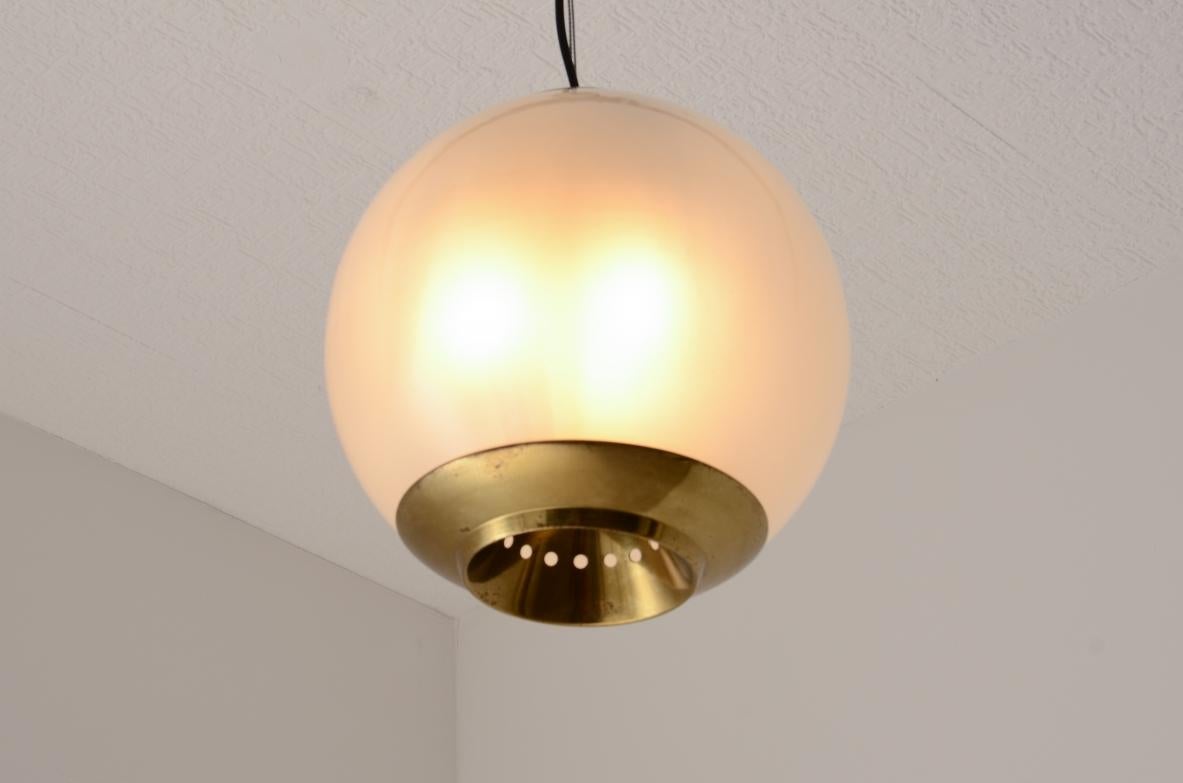 Luigi Caccia Dominioni

Large LPS8 model chandelier in glass and perforated brass.

Azucena 1960s manufacture.
​

diam 35 cm