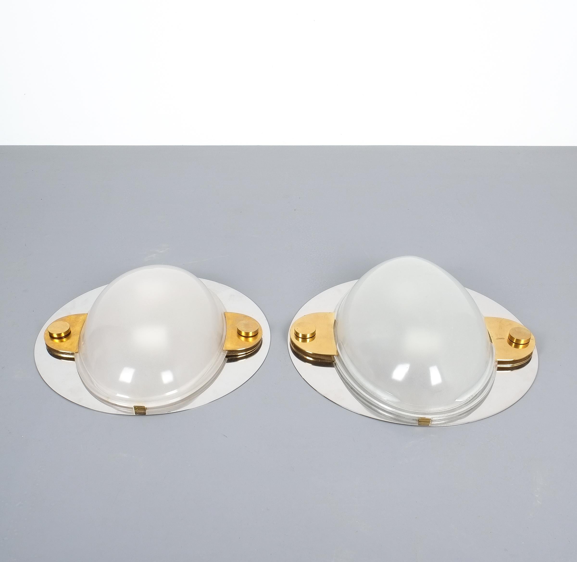 Luigi Caccia Dominioni flush mounts or sconces brass chrome glass, circa 1978. 

Pair of rare and large wall lights or ceiling lights comprised of chromed brass, brass and opaline glass. We have a pair that slightly differs in size. Dimensions are