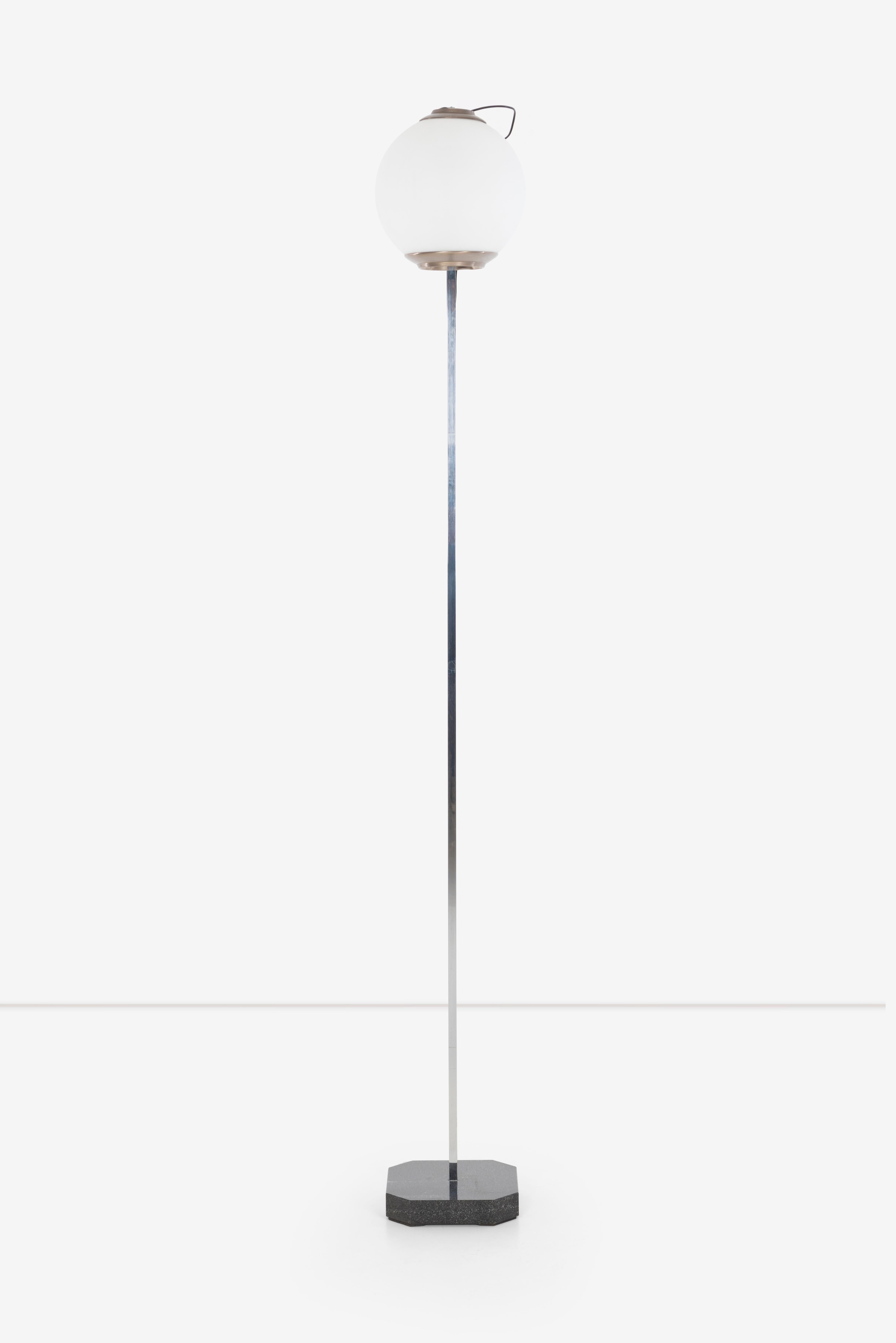 Luigi Caccia Dominioni
Lte 10 floor lamp, Black granite base with chrome-plated brass stem and frosted glass shade.