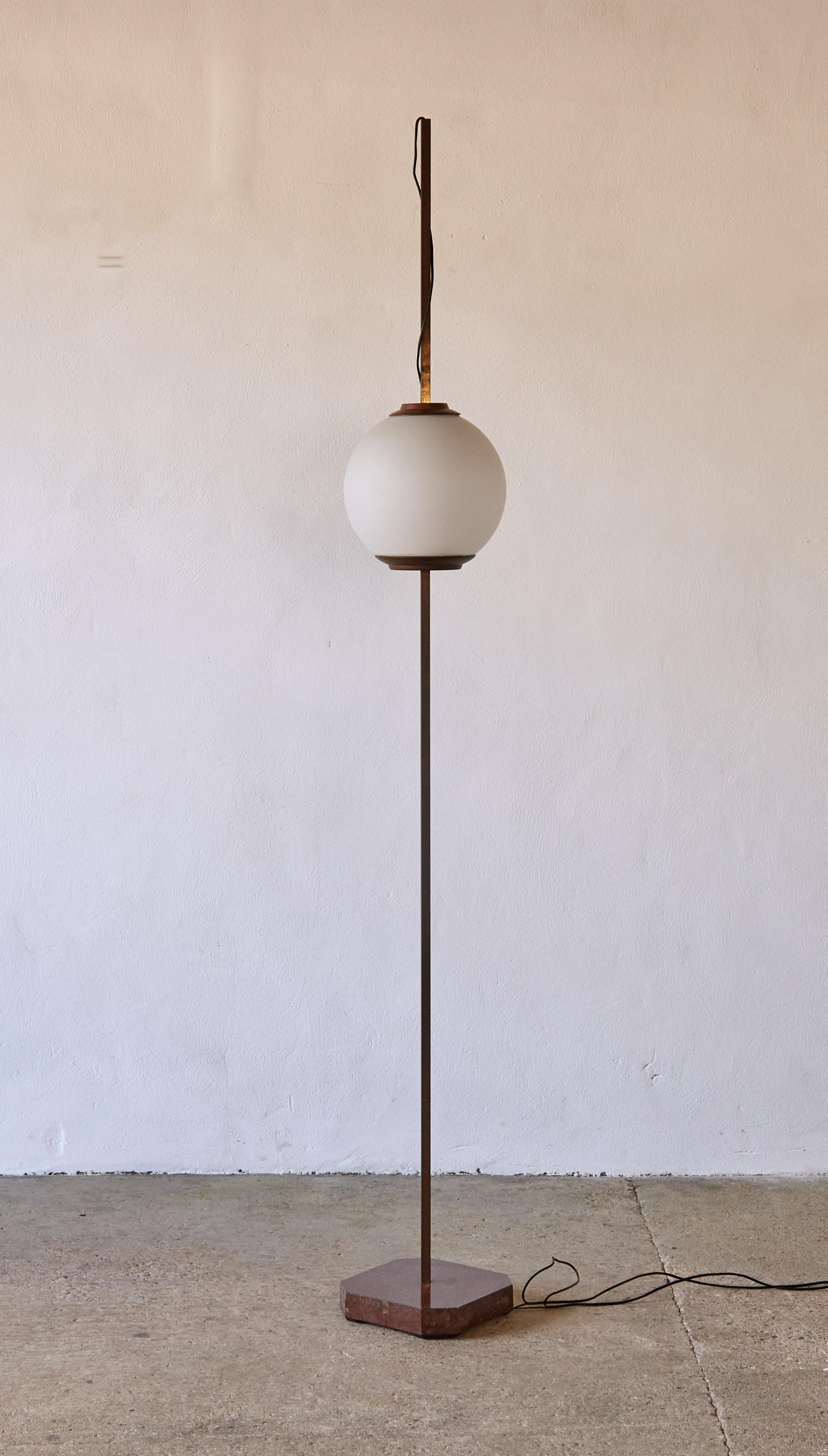 An elegant Luigi Caccia Dominioni LTE 10 Pallone floor lamp, made by Azucena, from Italy in the 1950s. With a marble base, brass frame and opaline glass shade. In good original vintage condition with signs of age. In working condition but requires