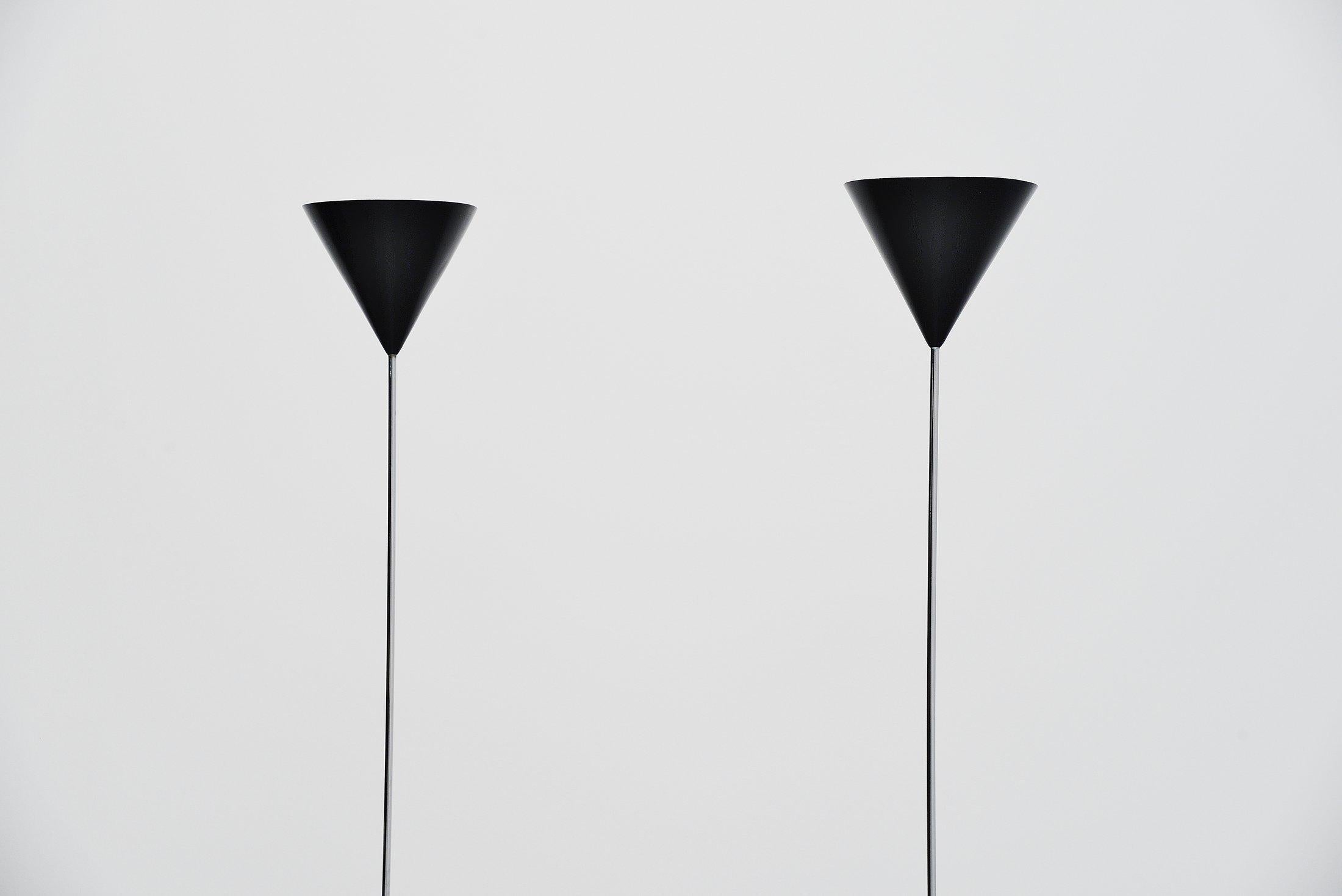 Very nice pair of model LTE5 Imbuto floor lamps designed by Luigi Caccia Dominioni and manufactured by Azucena, Italy, 1954. This is for a nice pair of floor lamps with black painted base and shade and chrome stems. The lamps are in very good