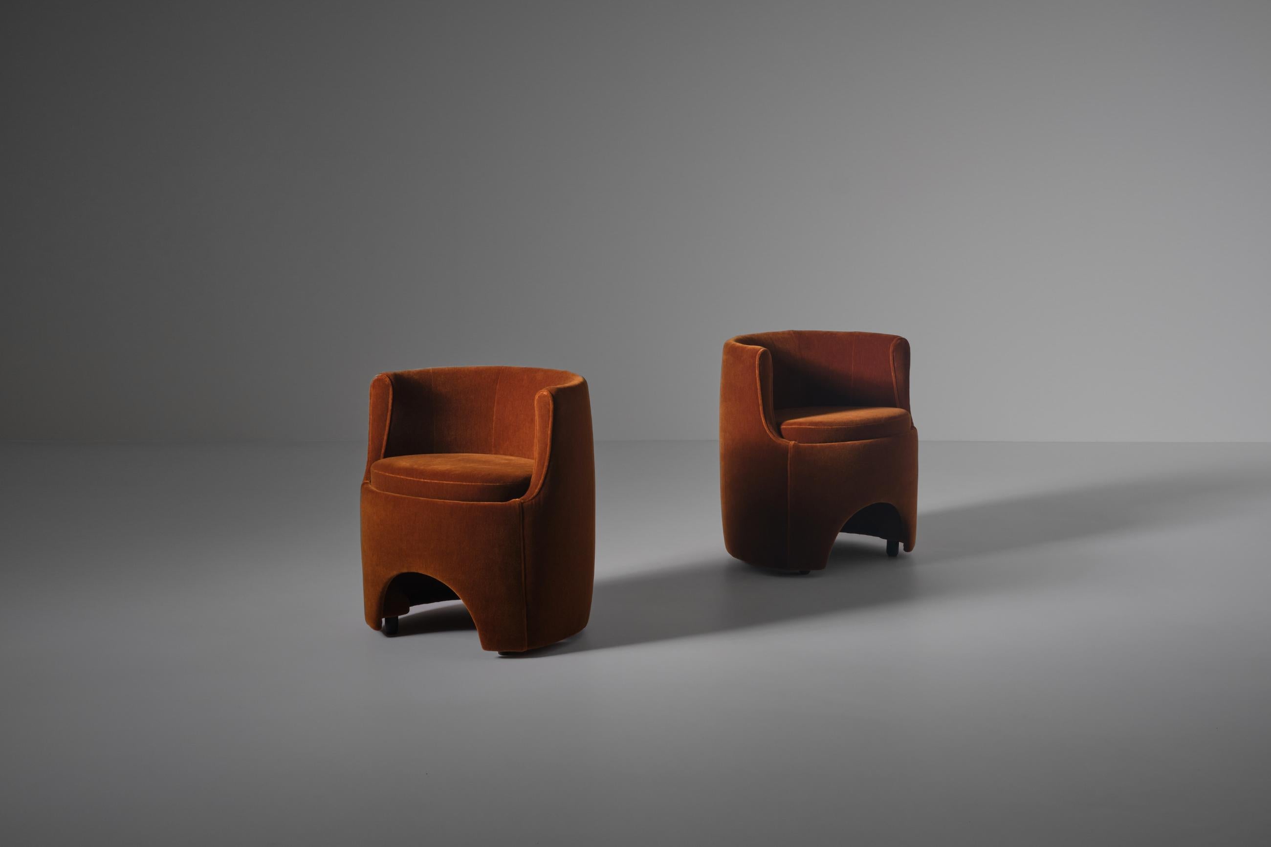 Pair of model 'P22 studio' chairs by Luigi Caccia Dominioni for Azucena, Milan 1975. The chairs are upholstered in a warm burnt orange Mohair velvet. Very nice rounded shapes which asks for refined upholstery skills, these details give the chairs a