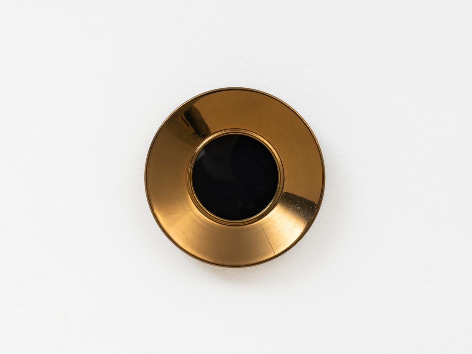 Round brass picture holder by Italian architect Luigi Caccia Dominioni, designed for Azucena, the manufacturer he co-founded together with Ignazio Gardella and Corrado Corradi Dell'acqua. 
Stamped 