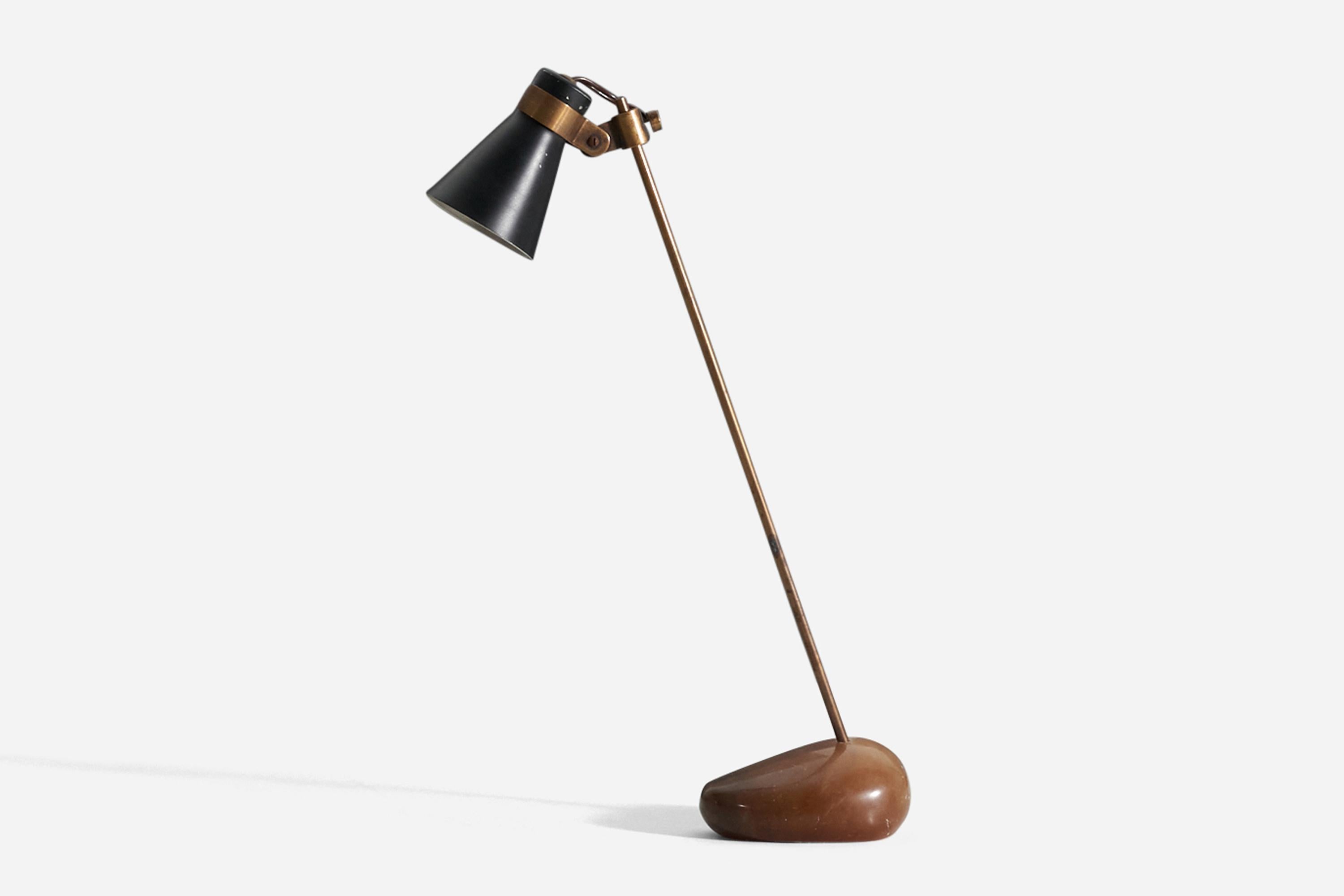A rare and early ‘Sasso’ table lamp designed by Luigi Caccia Dominioni and produced by Azucena, Milan, Italy, c. 1948. The lamp is comprised of a brass stem standing in a polished Iranian river stone base, with an anodized aluminum shade painted