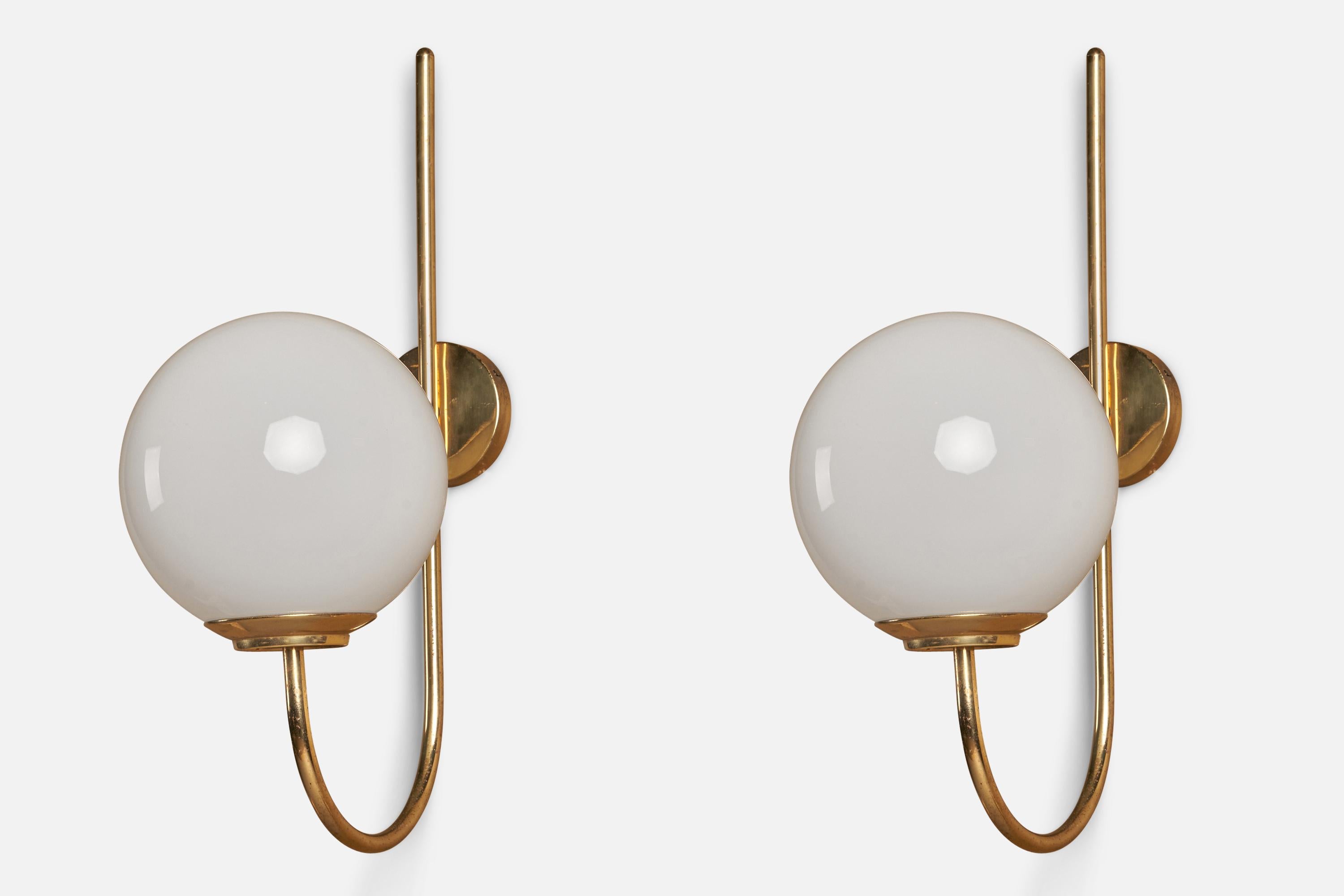 A pair of sizeable brass and opaline glass wall lights designed by Luigi Caccia Dominioni and produced by Azucena, Italy, 1950s.

Overall Dimensions (inches): 26.5