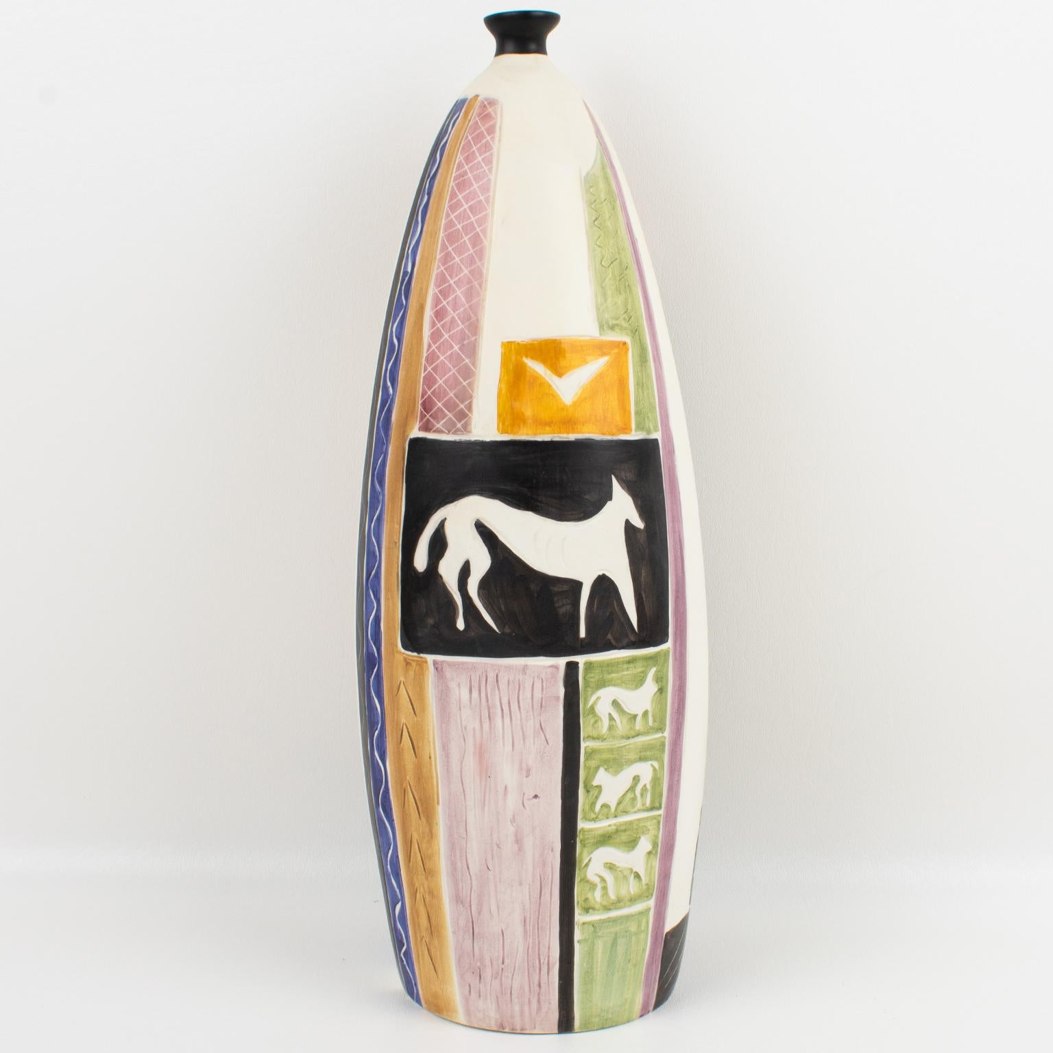 Luigi Carron designed this stunning Mid-Century Modern ceramic vase for Alcyone of Marostica, Italy, in the 1950s. The chunky amphora shape has hand-painted geometric and stylized animal designs. The design is different all around the vase. This