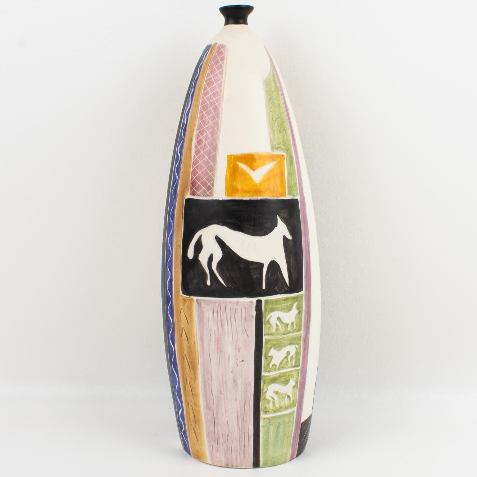 Luigi Carron designed this stunning Mid-Century Modern ceramic vase for Alcyone of Marostica, Italy, in the 1950s. The chunky amphora shape has painted geometric and stylized animal designs. The design pattern is different around the vase. This