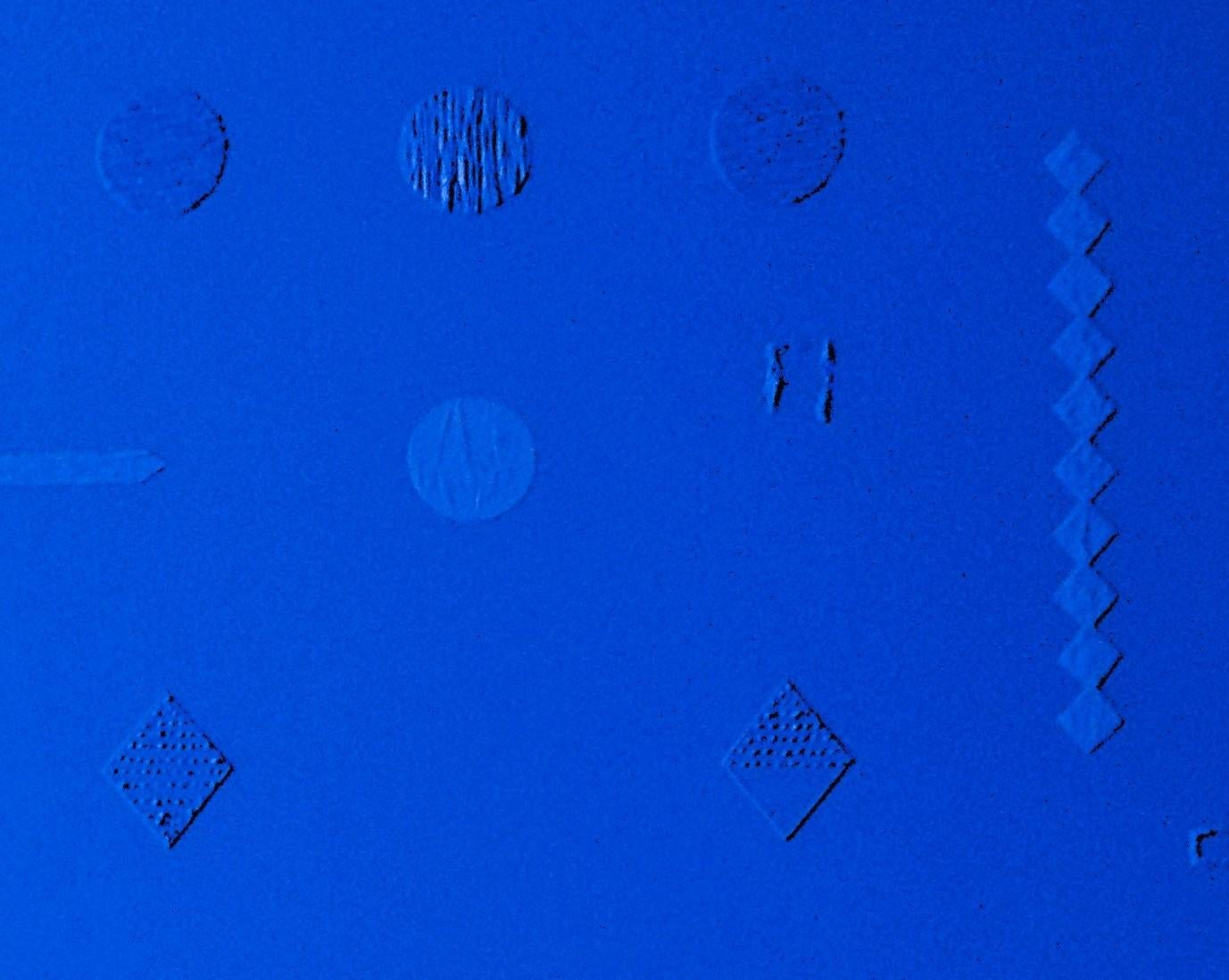 This artwork features a minimalist composition on a monochromatic blue background, punctuated by an array of meticulously arranged geometric forms. Subtle variations in texture and hue convey a sense of depth and movement, engaging the viewer's