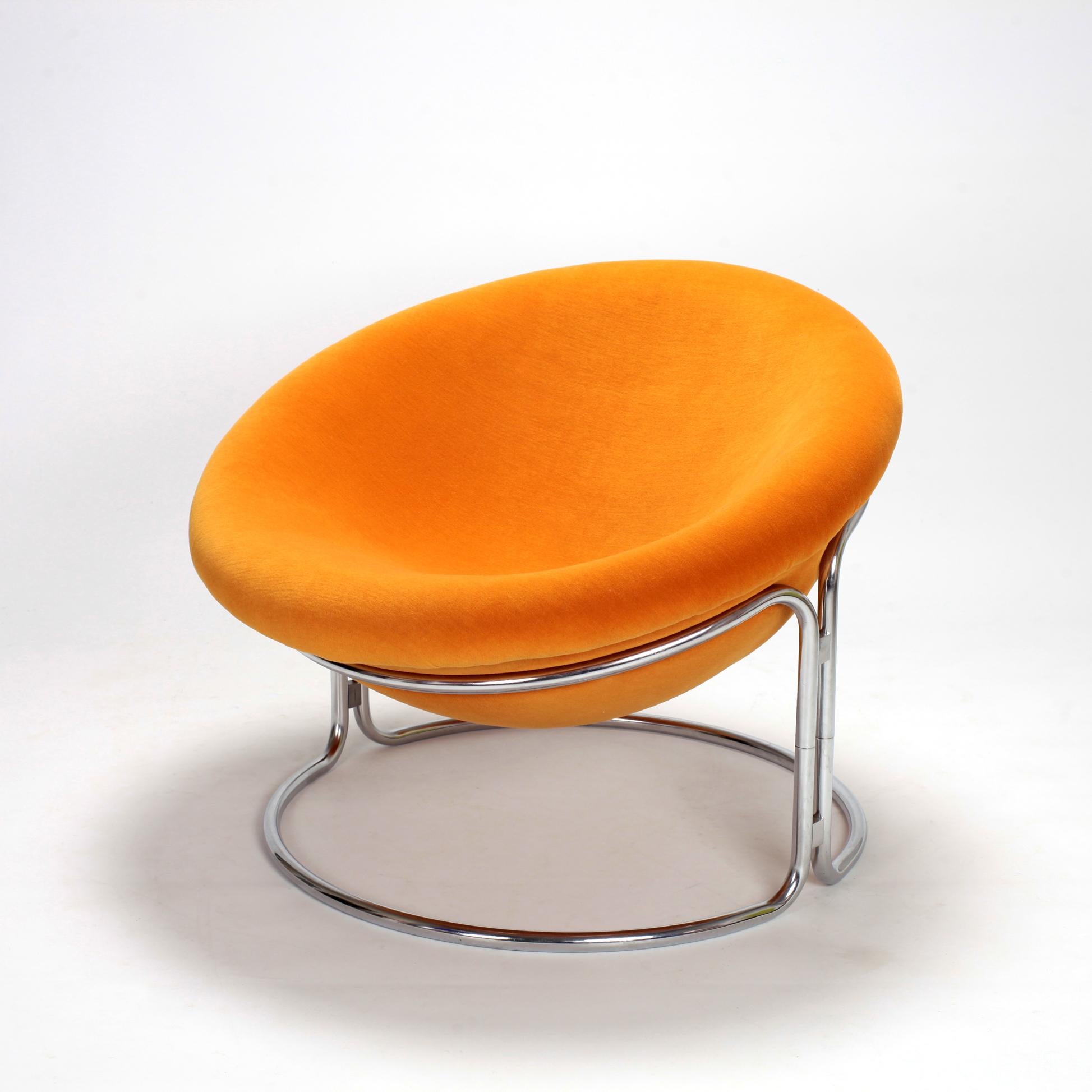 Luigi Colani spage age armchair for Kusch & Co 1968
Half sphere shape, organic design
Fiberglass shell and chrome-plated tubular metal frame
Reupholstered in shiny orange velvet fabric.