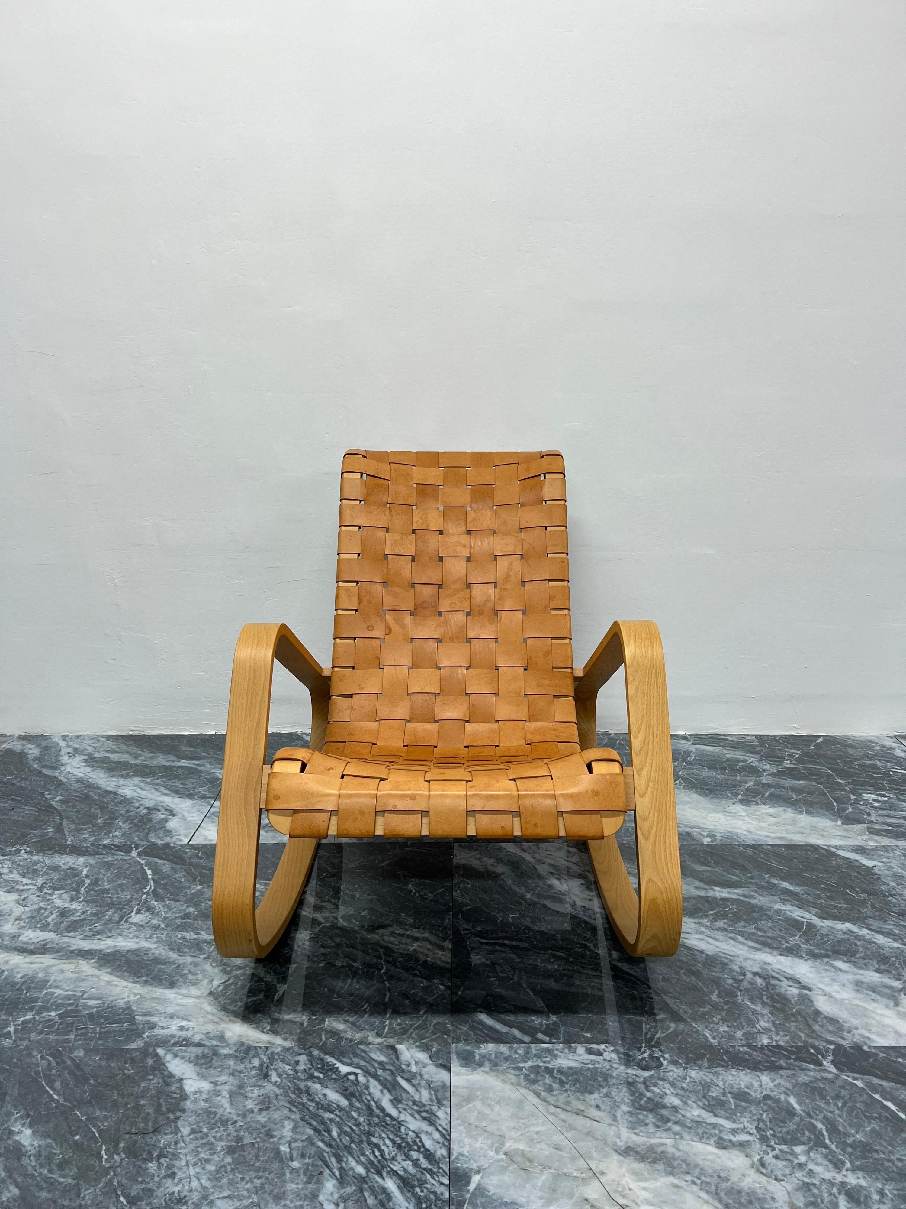 Bentwood frame rocker with tan woven distressed leather bands designed by Luigi Crassevig and produced by Crassevig Italy, 1970s.