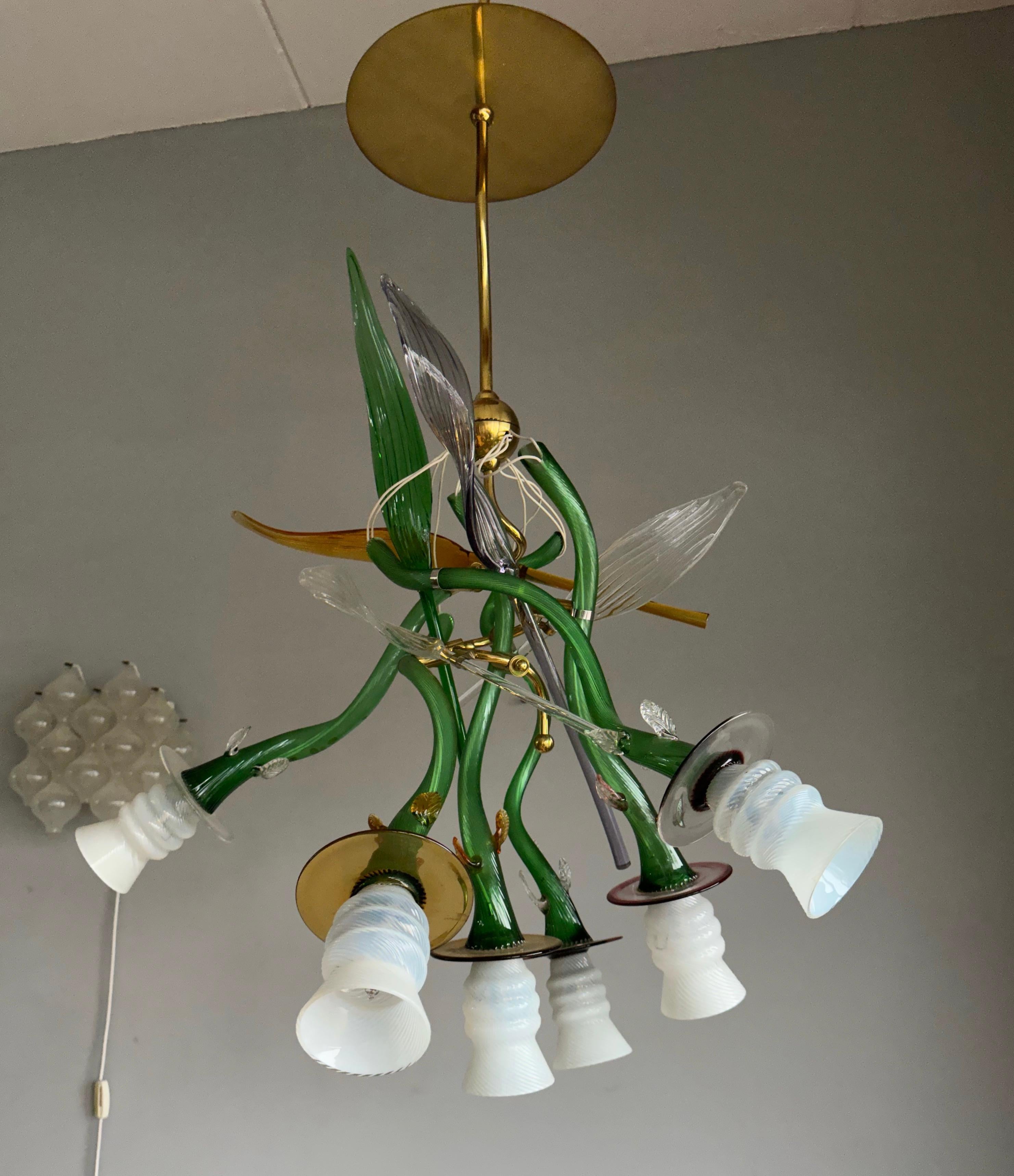 Large in size and stunning design, bouquet of flowers and six light chandelier.

This entirely hand-crafted chandelier is another one of our recent statement-piece-finds. This rare and marvelous chandelier consists of six uniquely mouth blown