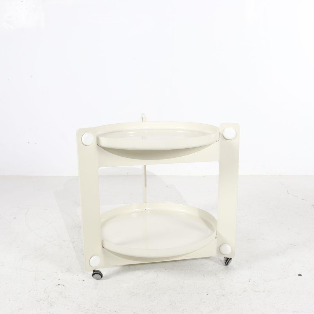 Space Age serving trolley by Luigi Massoni for Guzzini. An Italian design from the 1970s. The cream-white trolley is made of sturdy plastic and has practical wheels. In good vintage condition with light signs of use. The two removable circular trays