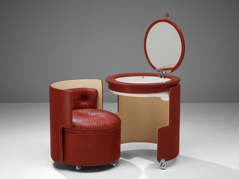 Luigi Massoni for Poltrona Frau, ‘Dilly Dally’ vanity set, steel, mirror, leatherette, fiberglass, Italy, design 1968

Outstanding Italian dressing table executed by Luigi Massoni (1930-2013) in a functional way. Both the table and the chair are