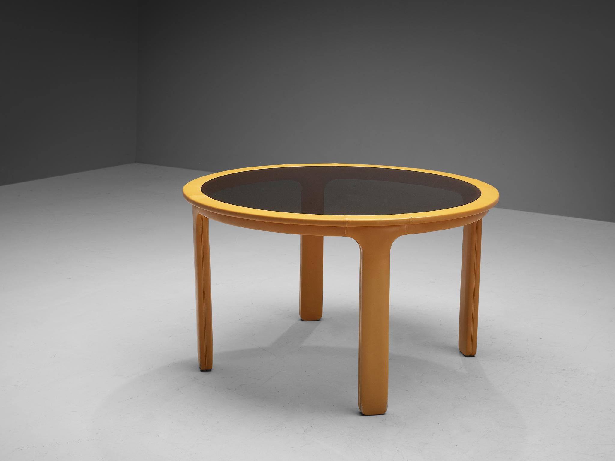Luigi Massoni for Poltrona Frau, dining table, leather, smoked glass, Italy, 1970s

Eccentric round dining table designed by Italian designer Luigi Massoni for Poltrona Frau. Its design truly radiates the seventies era. The frame is upholstered