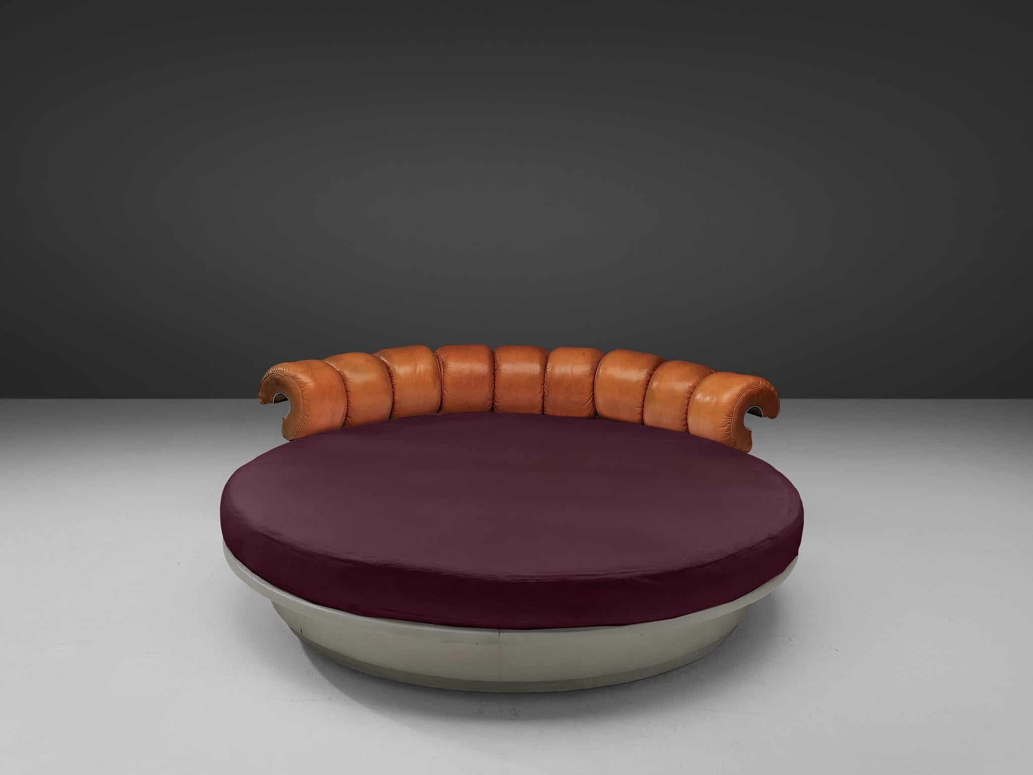 Luigi Massoni for Poltrona Frau, early 'Lullaby Due' bed, leather, wood and steel, Italy, 1968.

A 360° rotating bed with nightstands by Luigi Massoni for Poltrona Frau from the 1960’s. The roundLullaby Due features a headrest with a wing-shaped