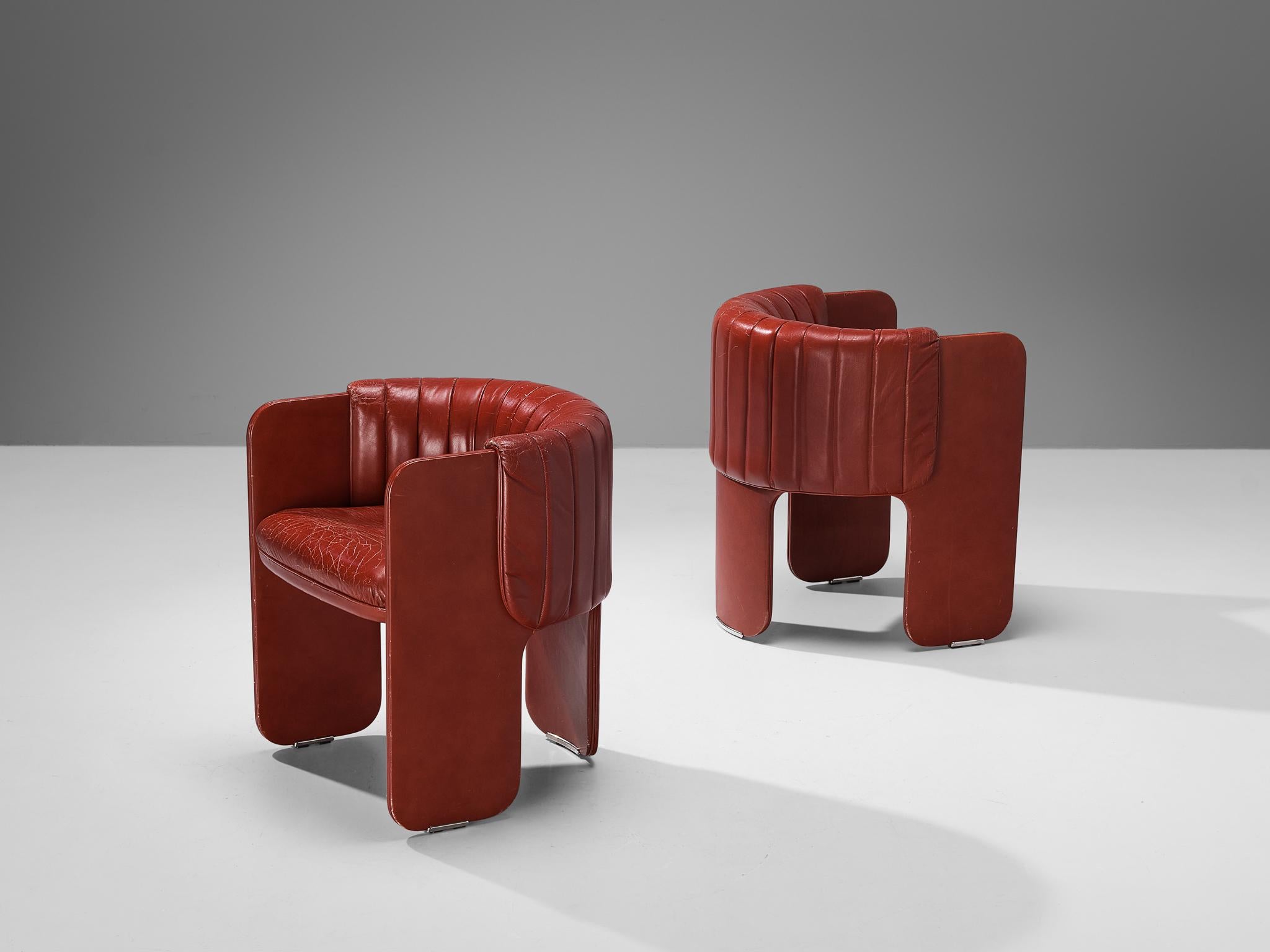 Luigi Massoni for Poltrona Frau, pair of armchairs, model ‘Dinette’, leather, chrome, Italy, 1980s

This pair of dining chairs epitomizes a splendid construction based on characteristic shapes and executed in a vivid burgundy red leather.