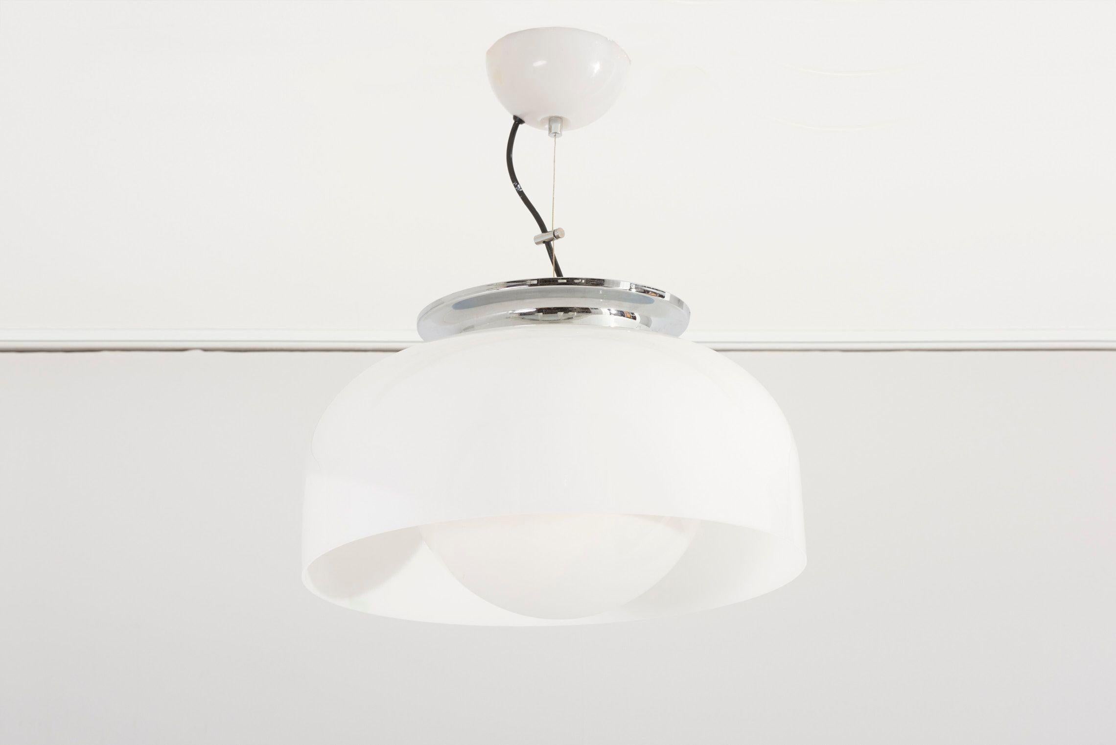 Pendant lamp by Luigi Massoni for Guzzini, Italy - 1970s. Chrome top on lucite shade. Socket: 1x E27. Please note: Lamp should be fitted professionally in accordance to local requirements.