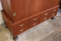 Luigi Massoni. Two-door wardrobe with drawers. Produced by "Mobilia" in 1950.