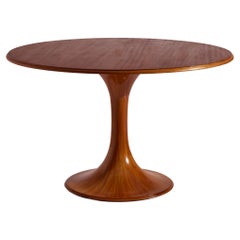 Luigi Massoni walnut Clessidra round dining table by Mobilia, Italy, 1960s