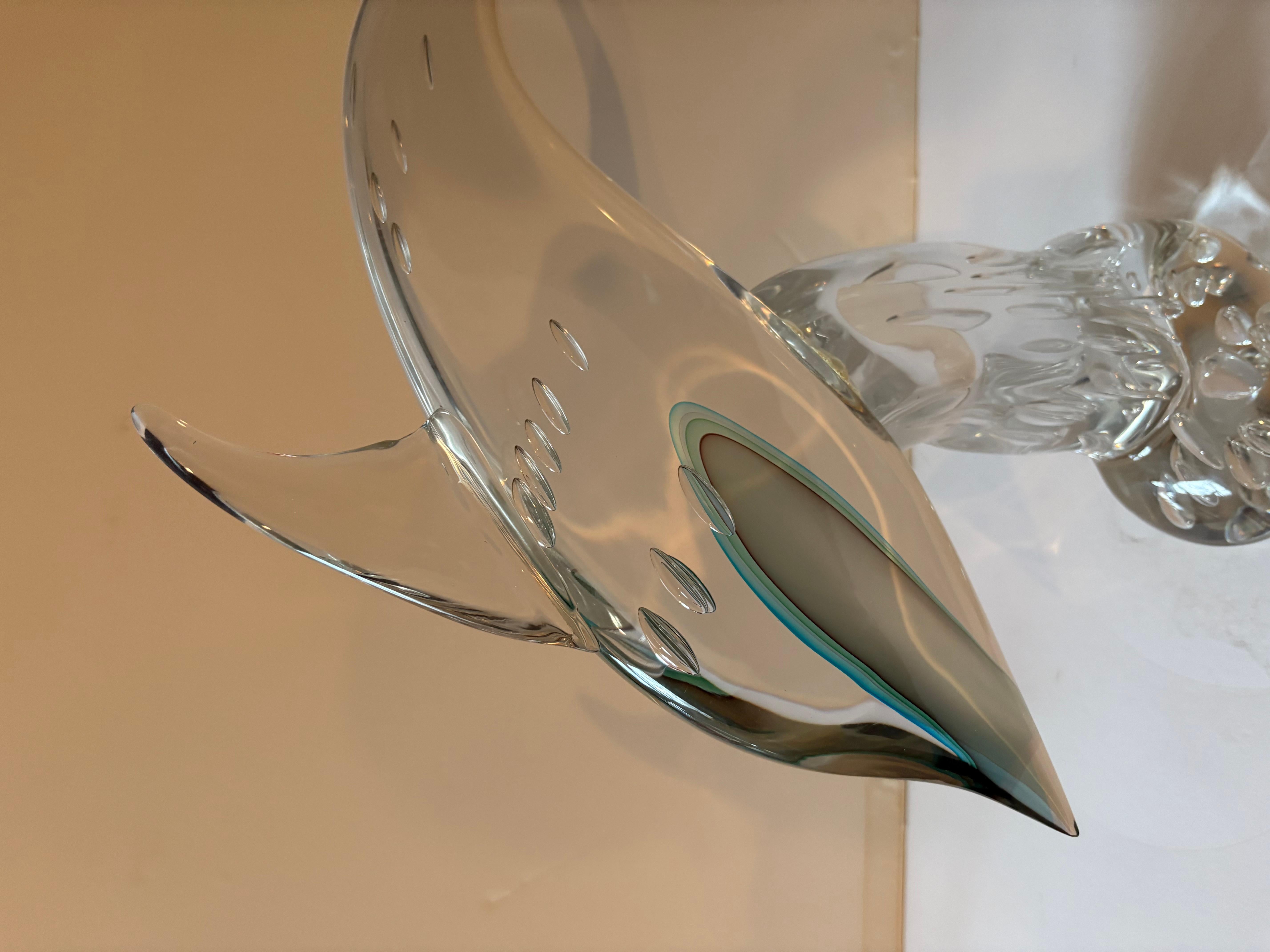 This is an Luigi Mellara original glass dolphin sculpture signed. In good condition. No cracks or chips. Measures 23x17