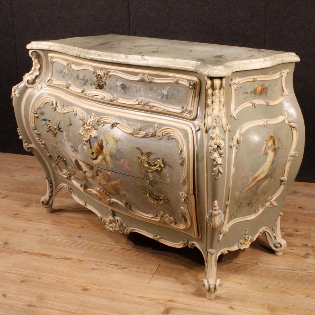 Exceptional Italian dresser from the early 20th century. Furniture pleasantly sculpted and finely painted with angels, signed lower left by the great painter Luigi Morgari (1857-1935). Commode for living room or important studio. Furniture with