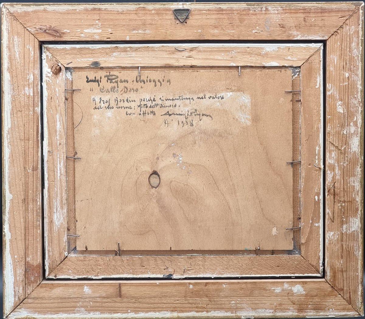 Olio su compensato, cm 24 x 29 (senza cornice)Cornice coeva, cm 42 x 48 Firmato e datato sul retro, questo affascinante dipinto di Luigi Pagan (attivo nella prima metà del Novecento) raffigura un vivace scorcio di Chioggia, con una suggestiva veduta