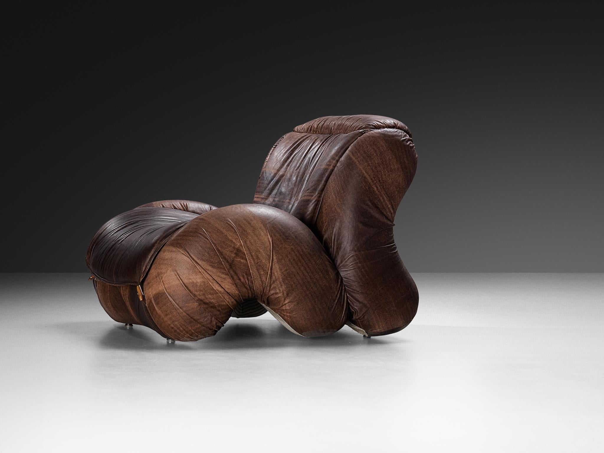 Luigi Radaelli, 'Tartana' lounge chair, leather, beech, Italy, 1970s 

This postmodern Italian lounge chair will surely grab the viewer's attention. The construction is based on enlarged biomorphic shapes with curvaceous lines and bold shapes