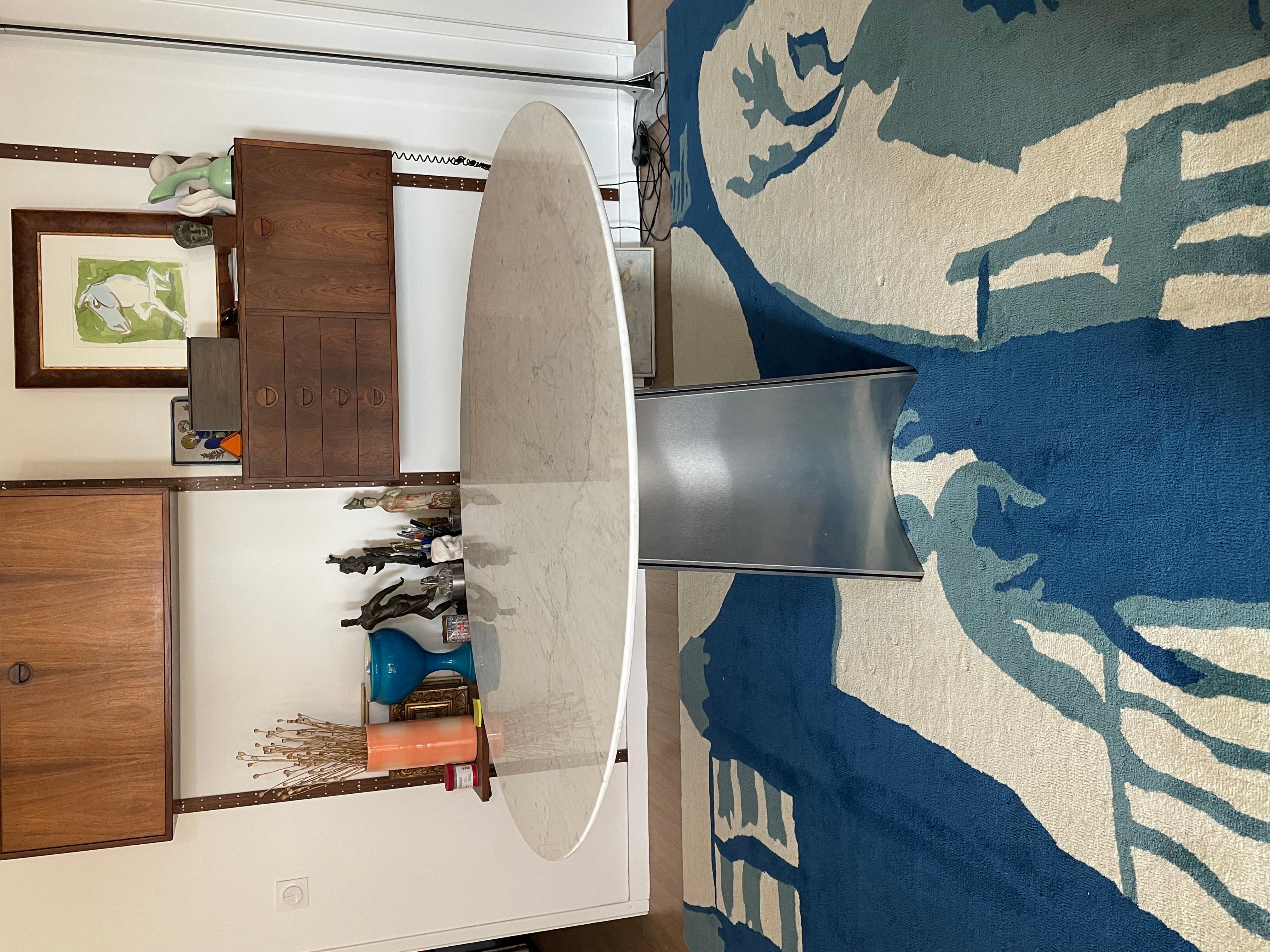Luigi Saccardo for Maison Jansen, round dining table, 1970

Round pedestal dining table, designed by the italian designer Luigi Saccardo for french renowned Maison Jansen, in the seventie's. The base is made of four brushed stainless steel plates,