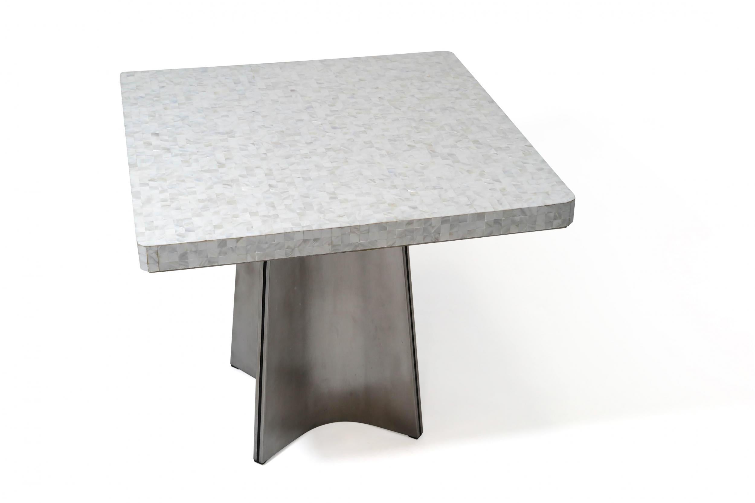 Square dining table designed by Luiggi Saccardo for Arremet, circa 1973. Italy. Aluminum star base with mother of pearl top surface. Good condition with minor signs of age and use, some marks on base. The table has a Luigi Saccardo stamp on the base.