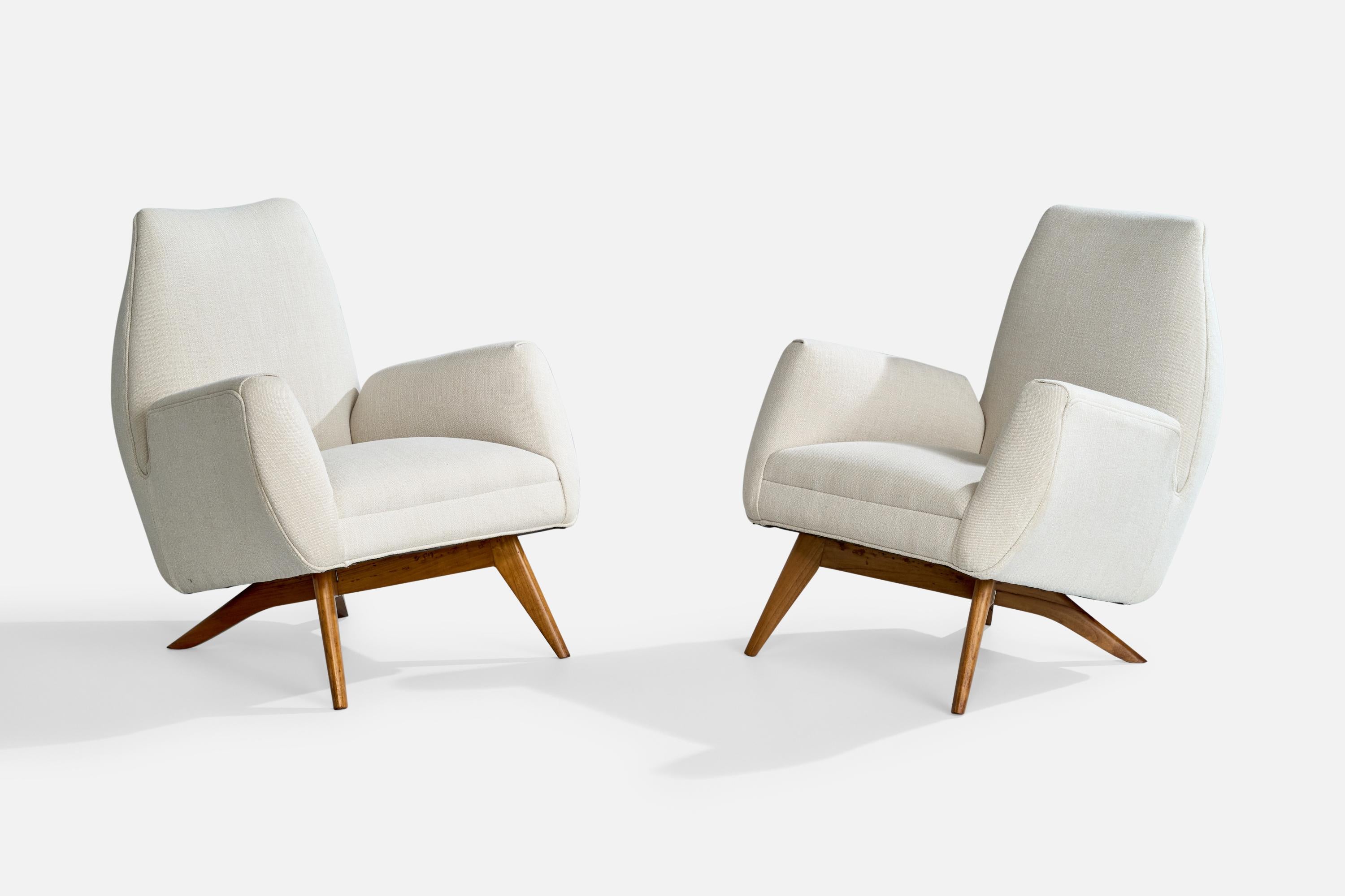 A pair of white fabric and wood lounge chairs designed and produced by Luigi Scremin, Italy, c. 1950s.

Reupholstered in brand new fabric. Legs refinished, break professionally repaired.

Dimensions: 31” H x 28.25” W x 27” D

Seat Height: 16”