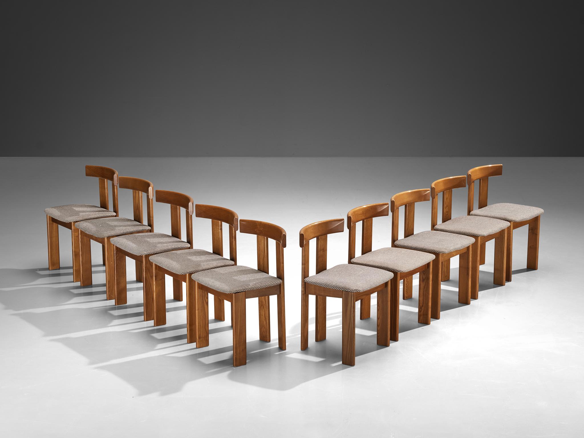Luigi Vaghi for Former, dining chairs, stained ash, fabric, Italy, 1960s. 

A characteristic 'T-chair' design; simplistic yet very strong in lines and proportions. Wonderful dynamic frame executed in ash, whereby the rear legs are installed closer