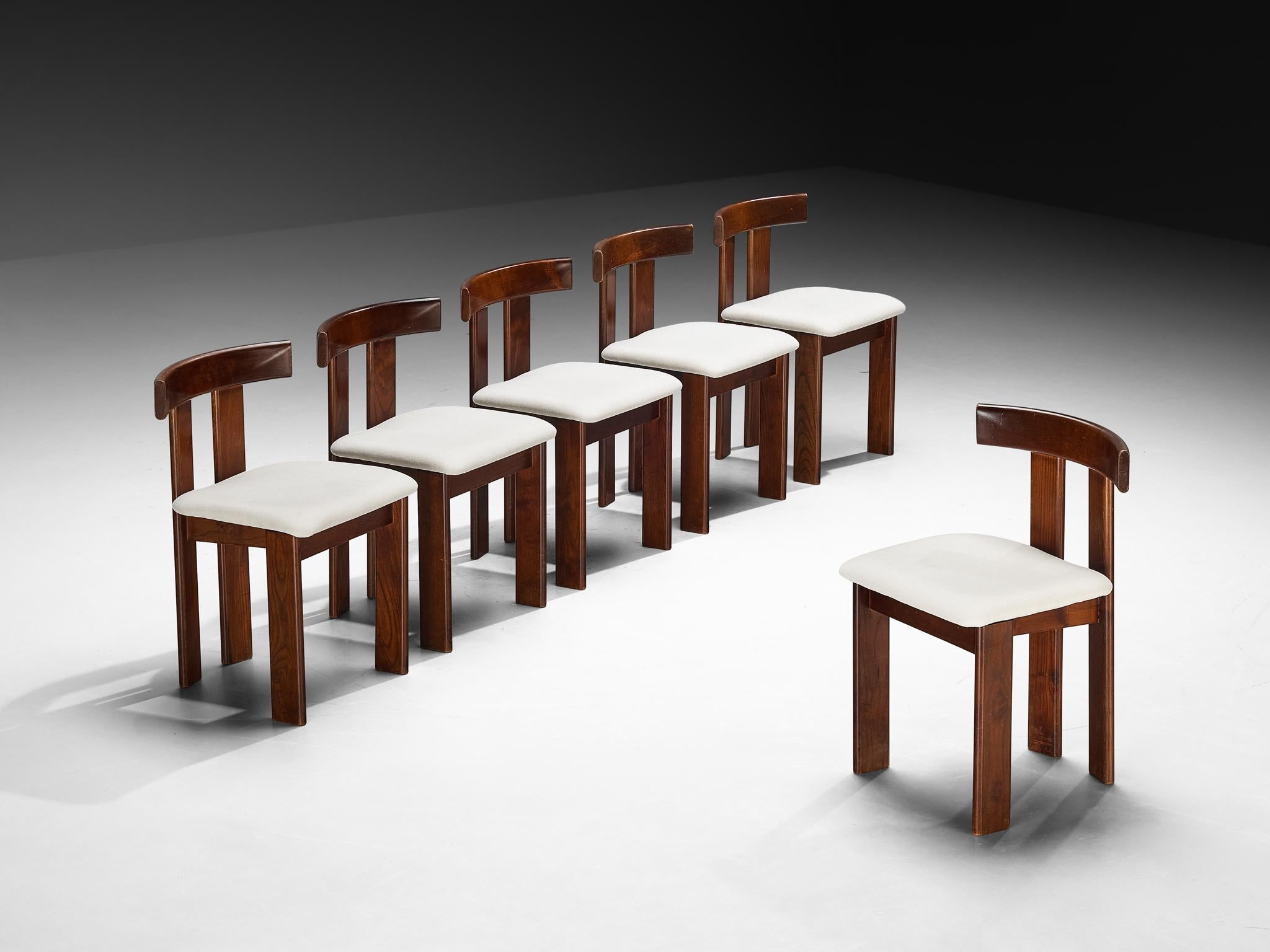Luigi Vaghi for Former, set of six dining chairs, stained ash, fabric, Italy, 1960s

A characteristic 'T-chair' design; simplistic yet very strong in lines and proportions. Wonderful dynamic frame executed in ash, whereby the rear legs are installed