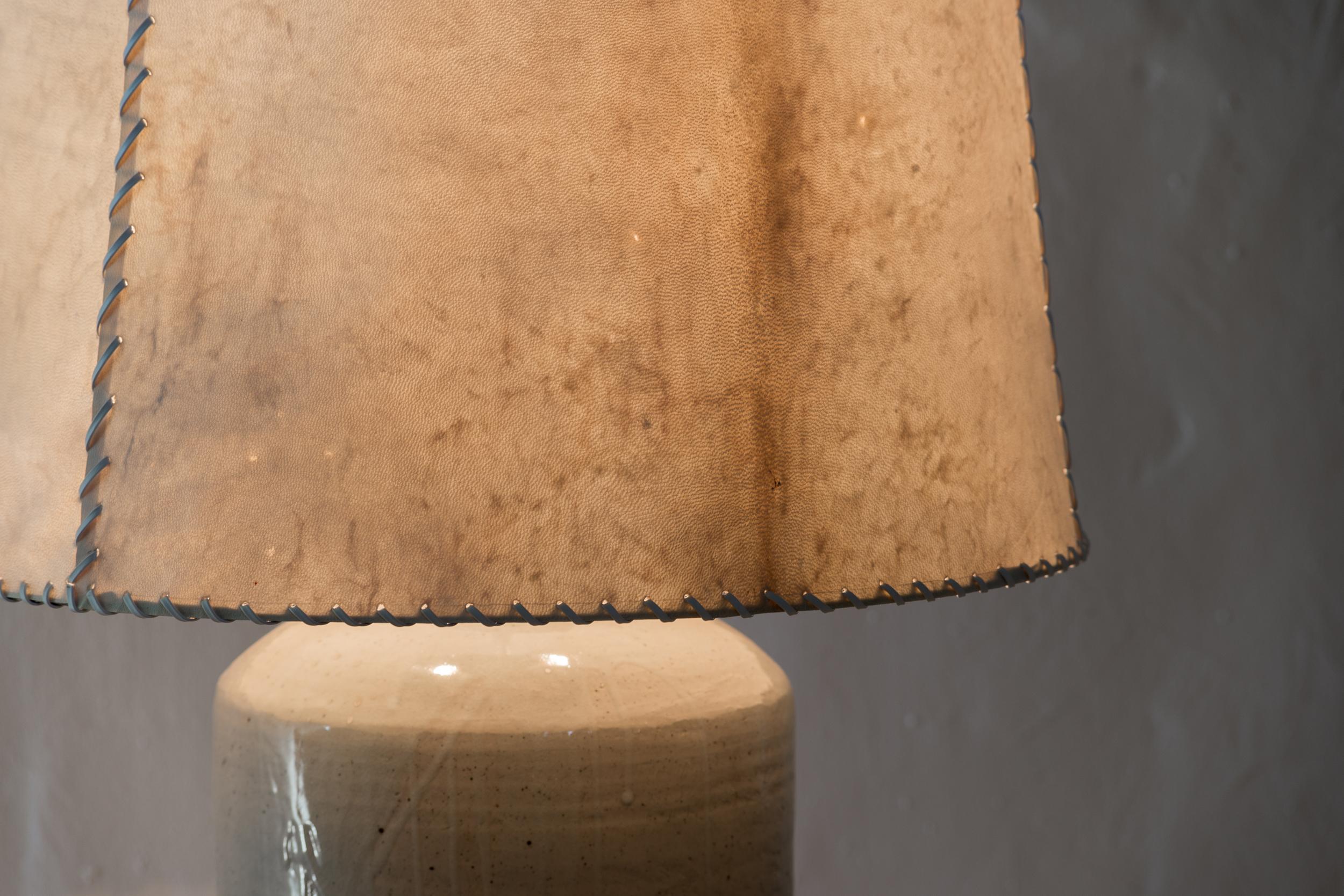 Luis Barragan (1902-1988)

Ceramic table lamp
From Casa del Pedregal (Casa Prieto López)
Manufactured by Hugo X. Velázquez
México, 1952
Ceramic, parchment leather

Measurements:
Total height 103 cm
Vase height 58 cm
Diameter 46