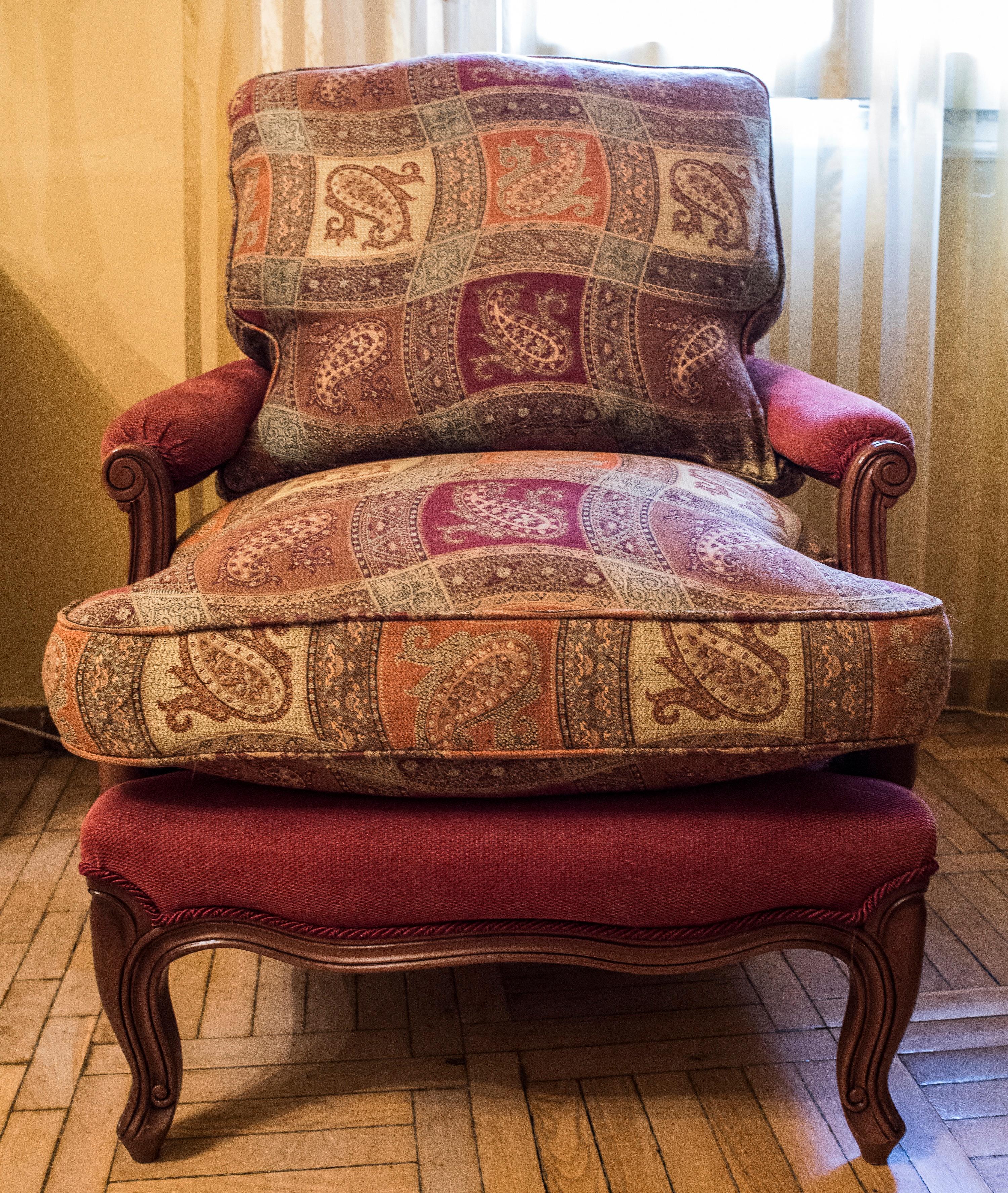 A stunning couple of walnut Luis XV style French armchairs. In a new condition, uplostered with pink ottoman fabric and paisley design. Beautiful and comfortable, they give un touch of timeless elegance to anywhere.
