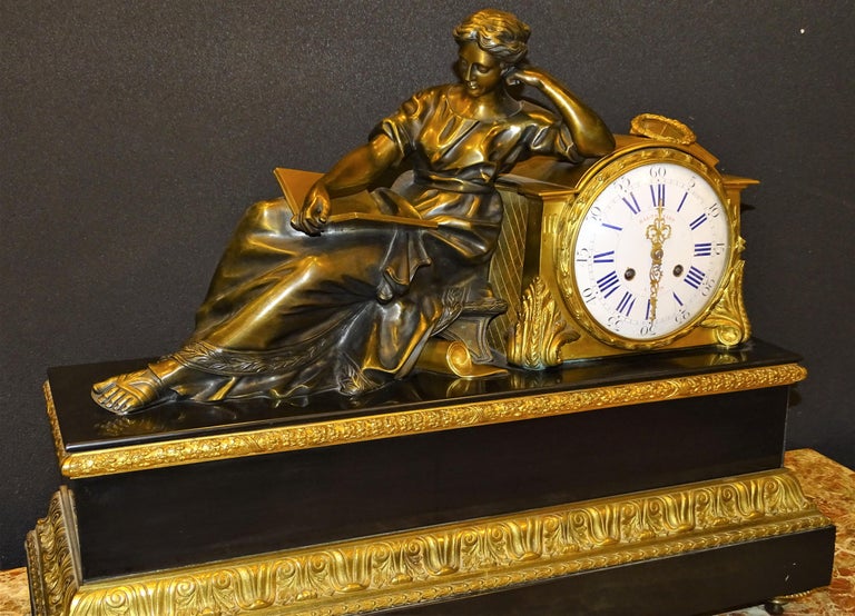 One of a kind table clock in blued bronze and mercury gilt bronze 