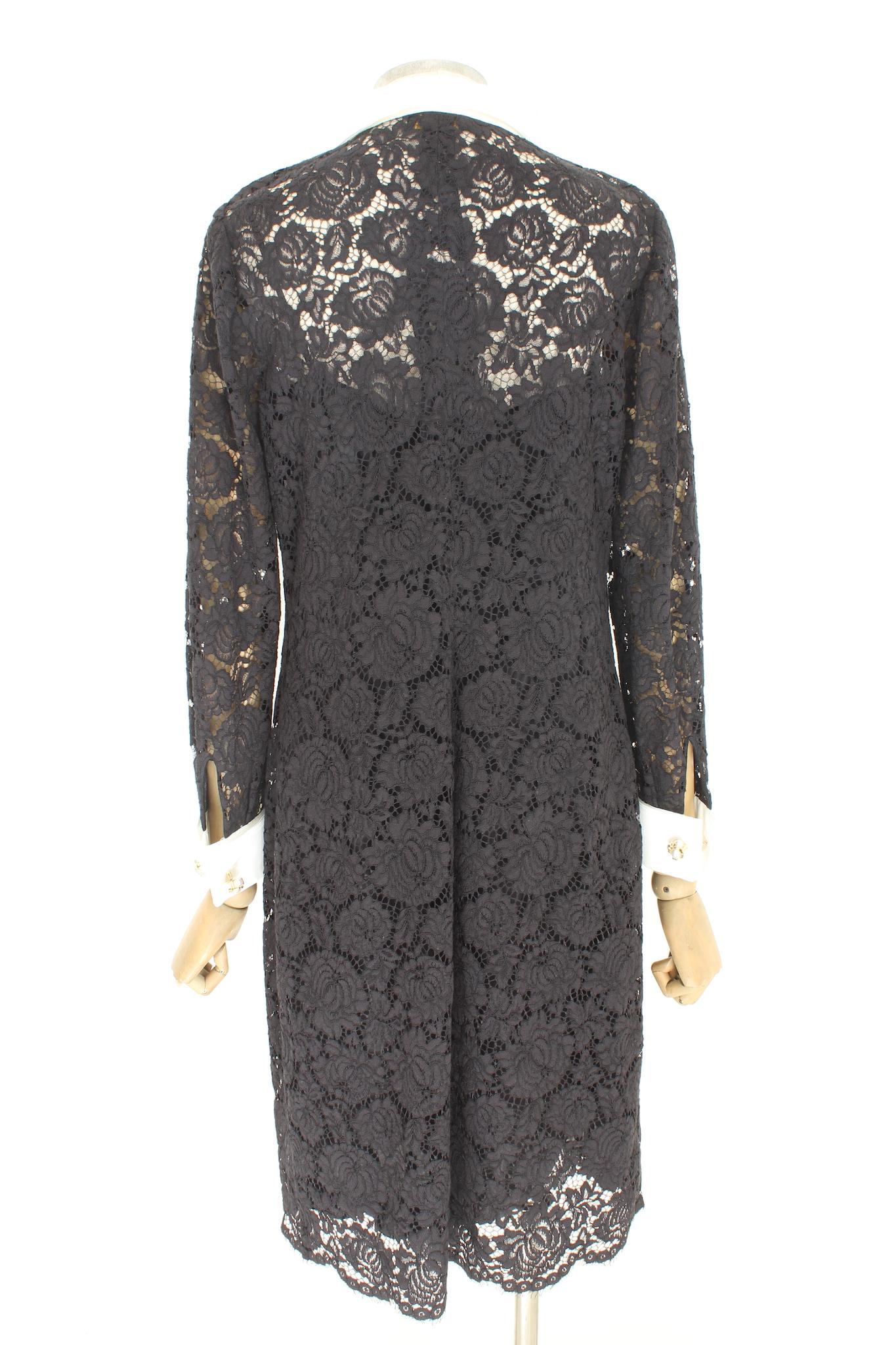 Luisa Spagnoli elegant dress 2000s. Lace evening dress with floral pattern, black color with white cuffs and collar. Closure with pearl jewel buttons. Cotton fabric, black slip inside. Made in italy.

Size: 46 It 12 Us 14 Uk

Shoulder: