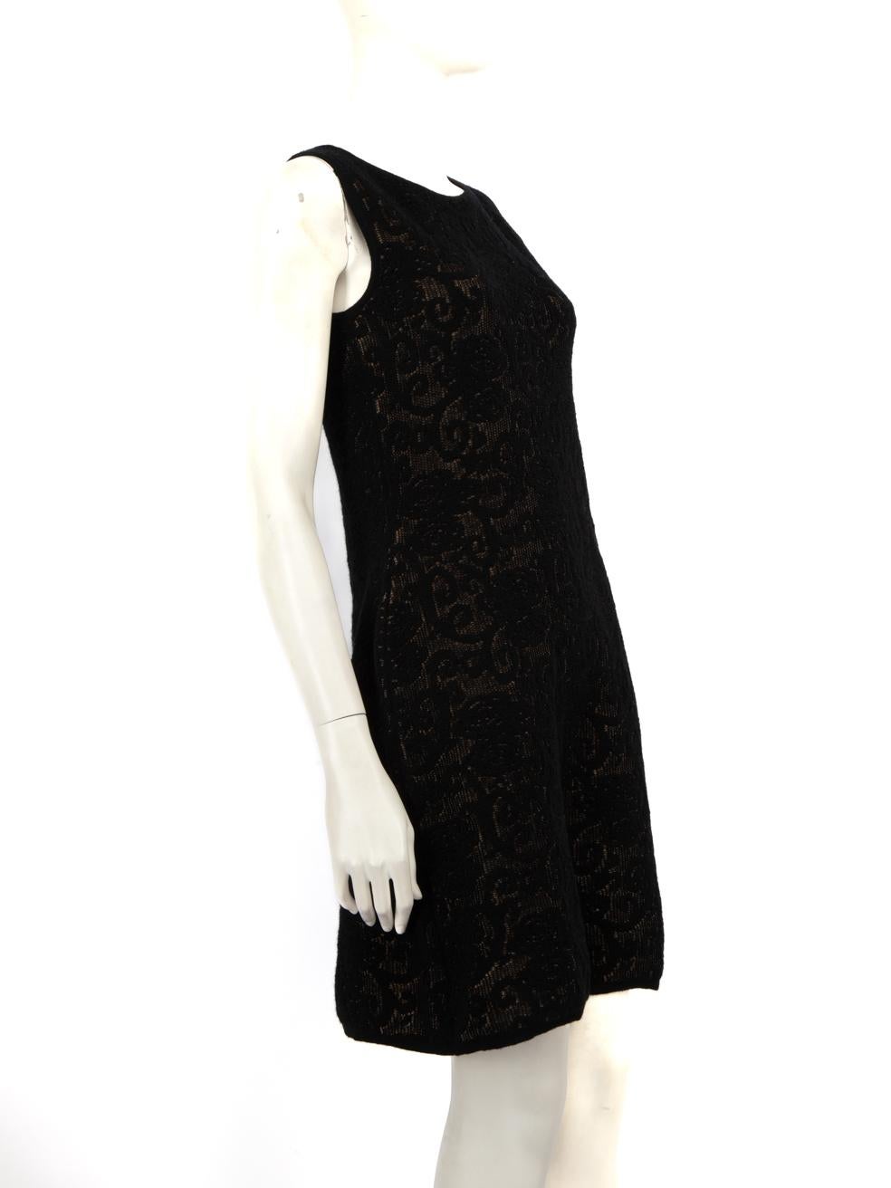 CONDITION is Never worn, with tags. No visible wear to the dress is evident on this new Luisa Spagnoli designer resale item.
  
  Details
  
  
  
  
  Black - beige undertone 
  
  Wool 
  
  Dress
  
  Sleeveless 
  
  Mini 
  
  Figure-hugging 
 