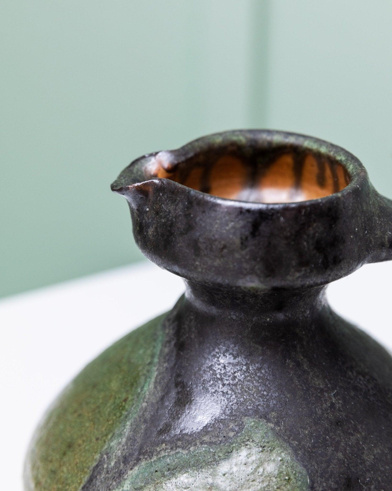 Vaso in ceramica con lava grassa dello Studio A di Luise Duncker - Vintage Mid Century Design 1970s

Immergiti nell'esclusivo design vintage della metà degli anni '70 con la brocca in ceramica dello Studio A di Luise Duncker. Questo vaso verde e