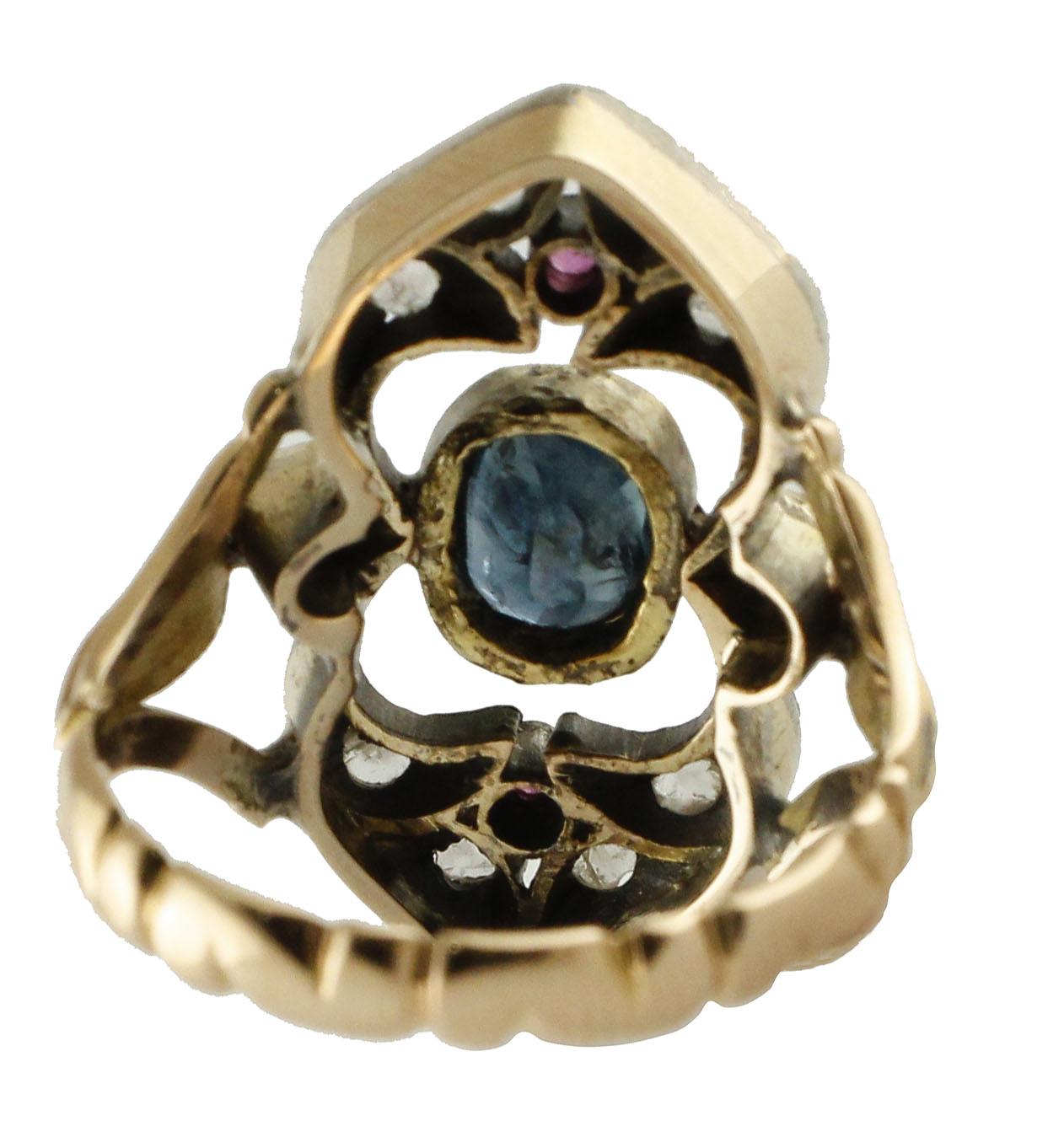 

Retro ring in 12kt yellow gold and silver composed of a central blue sapphire surrounded by diamonds and rubies.
diamonds 0.18kt
tot weight 5.9gr
r.f.  iea
For any enquires, please contact the seller through the message center.
