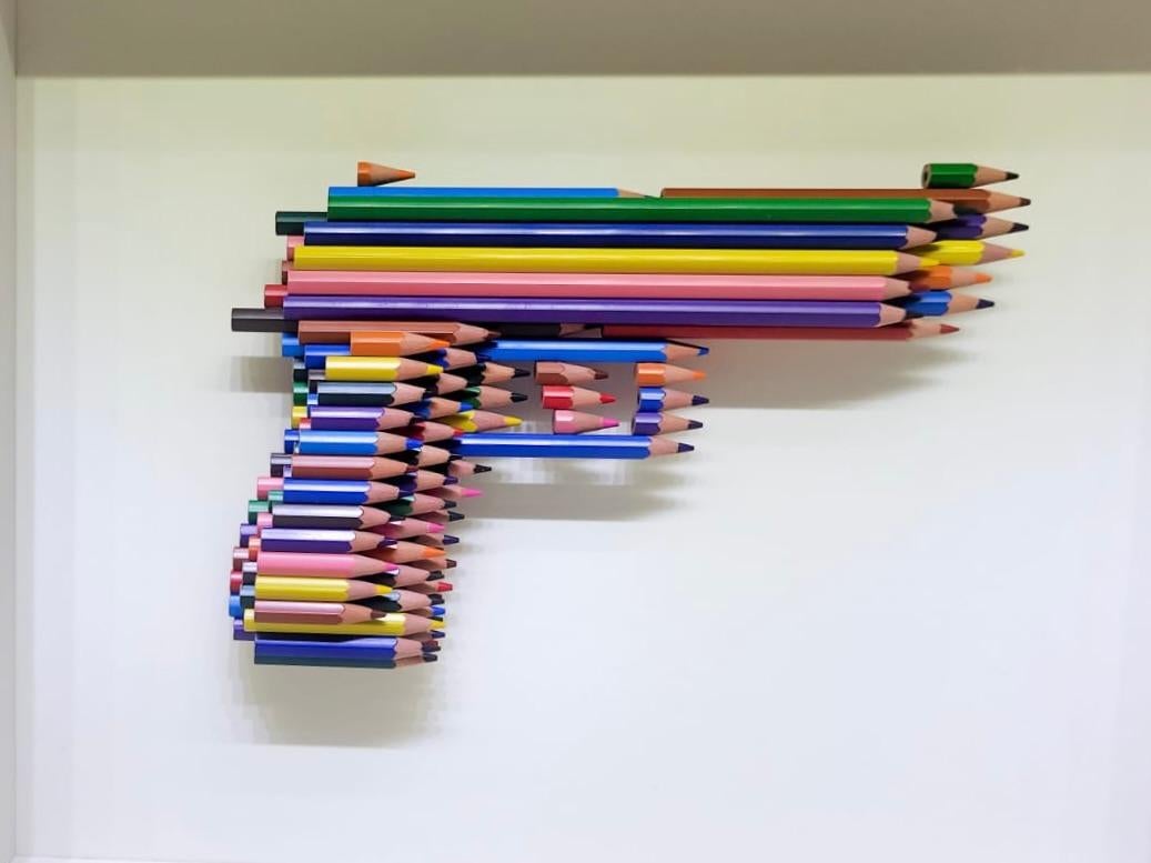 Unique Artwork in crayons.
About the work: CRAYONS NOT CARNAGE
In January 2015 following the terrorist attacks that hit Charlie Hebdo magazine in France, Luke Newton created his first pencil gun.
The work  was part of the conceptual approach of the