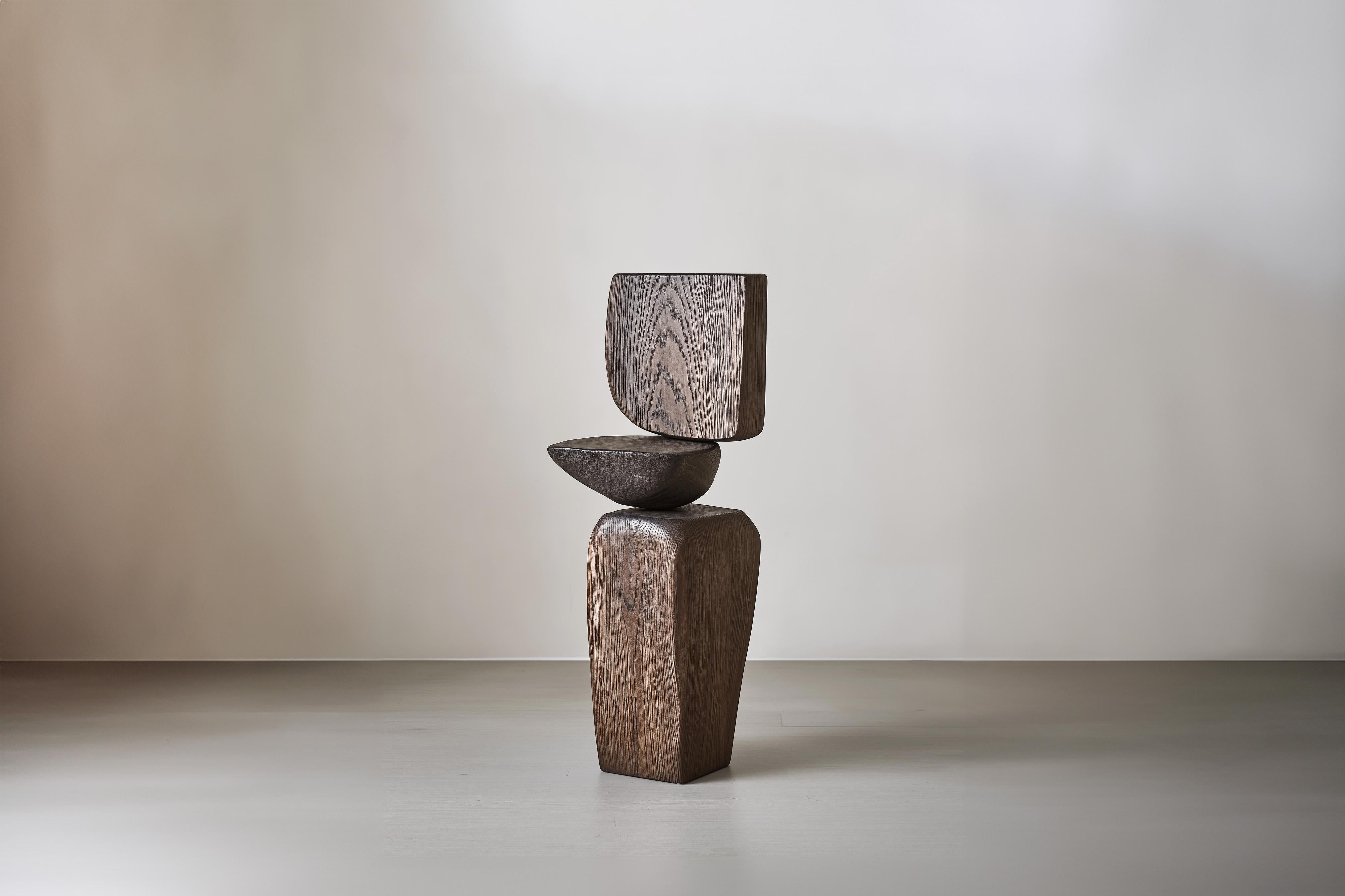 Lull No11 Decorative Wooden Sculpture – Organic Form for Modern Spaces

———
Balance and tension are at the core of these sculptures. The interplay between the smooth, rounded forms and solid, angular bases creates a delicate equilibrium that invites
