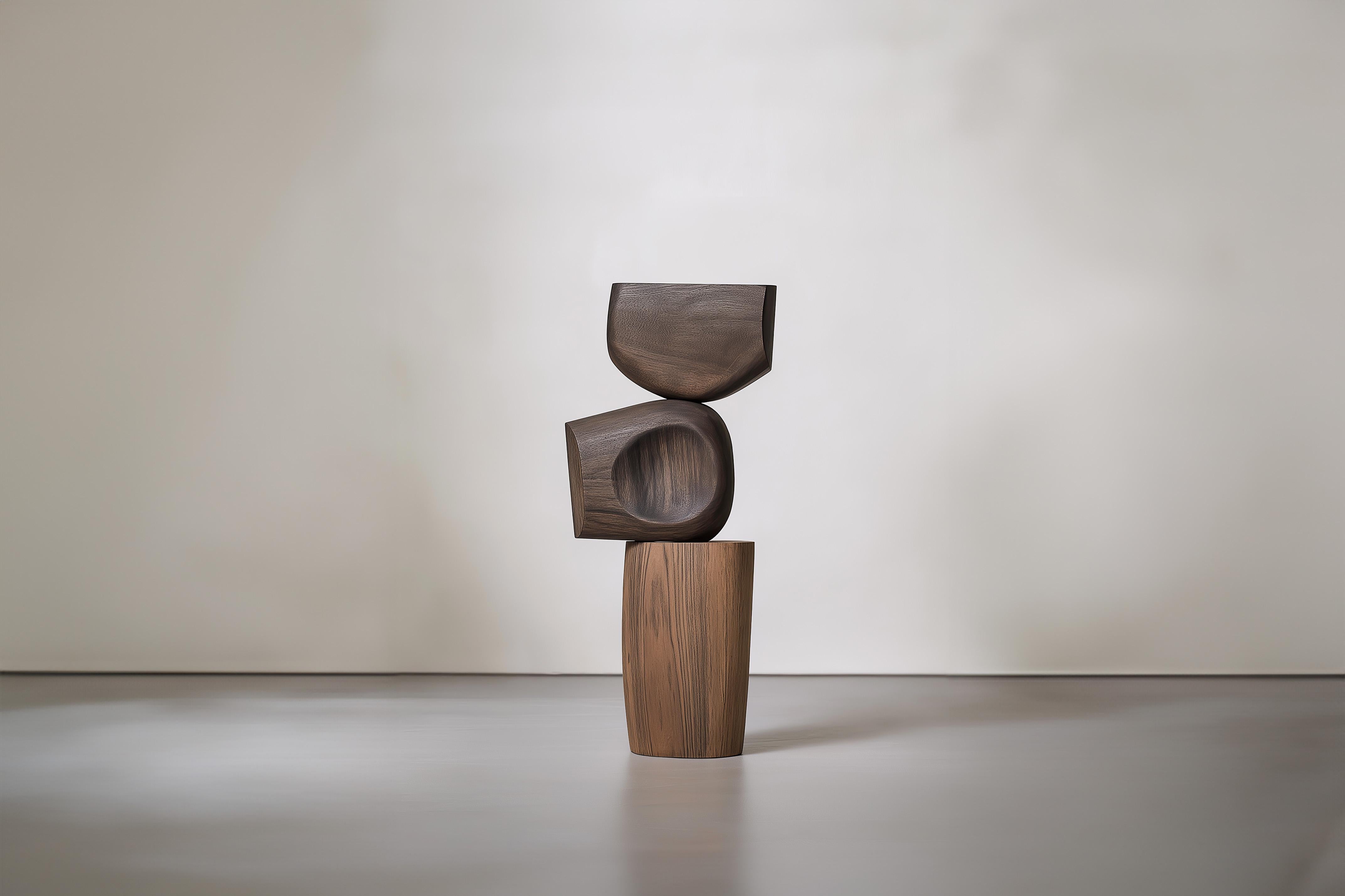 Lull No15 Solid Wood Artistic Feature – NONO’s Decorative Object for Modern Homes

———
Balance and tension are at the core of these sculptures. The interplay between the smooth, rounded forms and solid, angular bases creates a delicate equilibrium